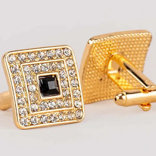 Gold and silver cufflinks being cleaned and polished