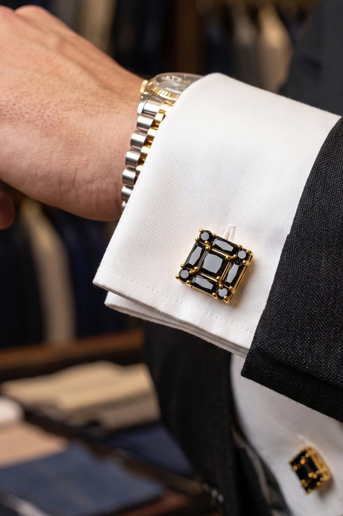 Men’s Zirc Onyx cufflinks featuring deep black onyx stones set in intricate metal detailing for formal elegance and luxury.
