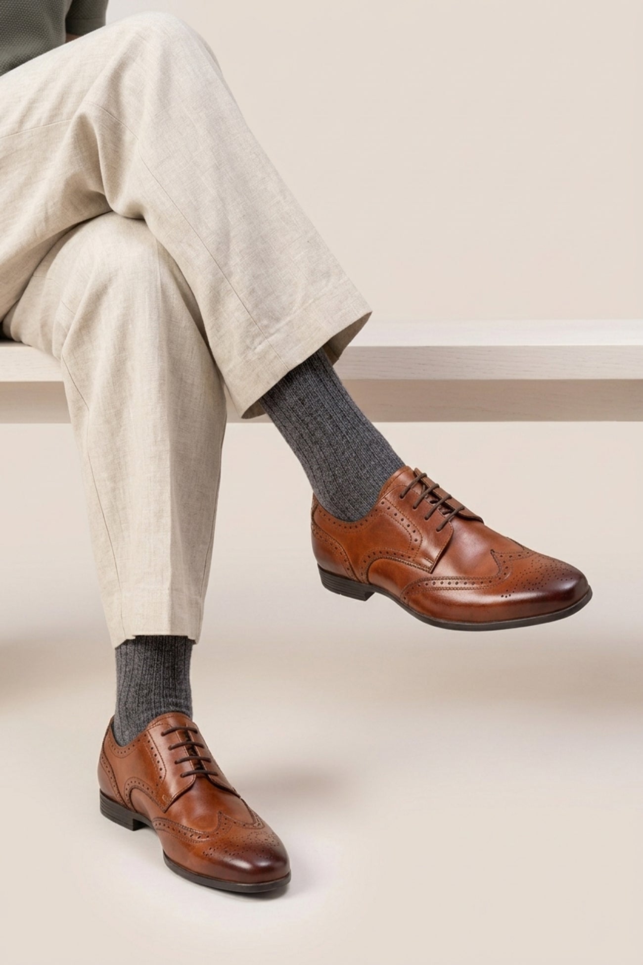 Model wearing Miller Tan sophisticated derby brogue showcases expert craftsmanship that refuses to compromise on style or comfort.
