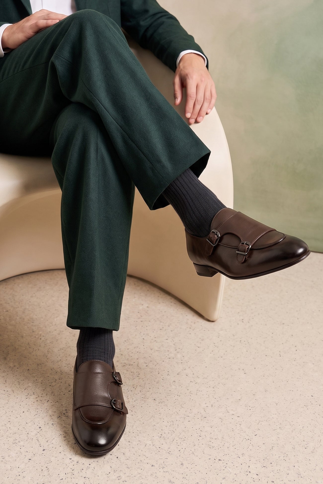 Model wearing Clifford Brown monk leather loafer for men featuring premium brown leather and classic monk strap design, ideal for smart and formal wear.