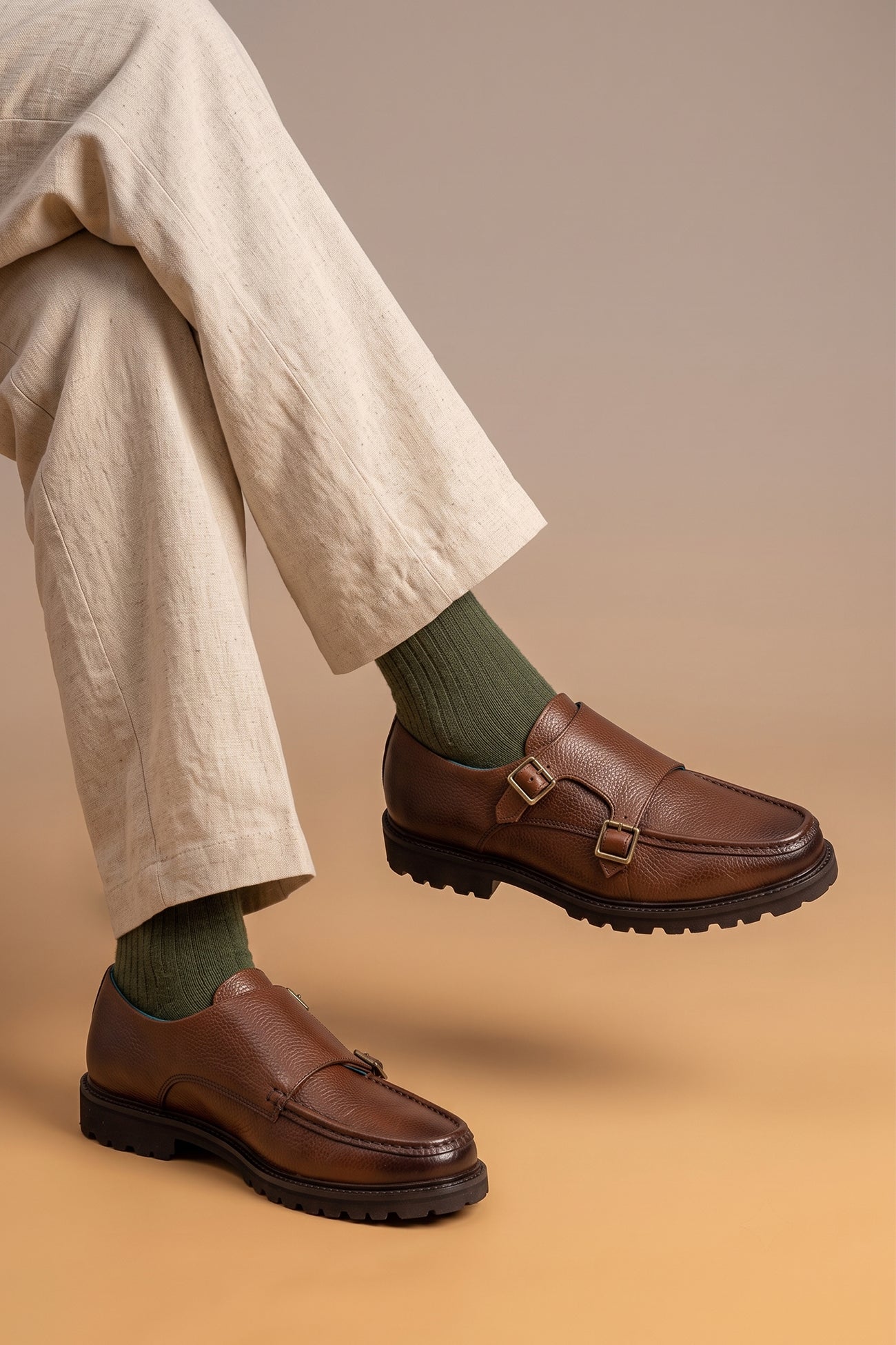 Model wearing Ethan Brown monk strap leather shoes for men, made from premium brown leather with classic design, ideal for formal and smart casual occasions.