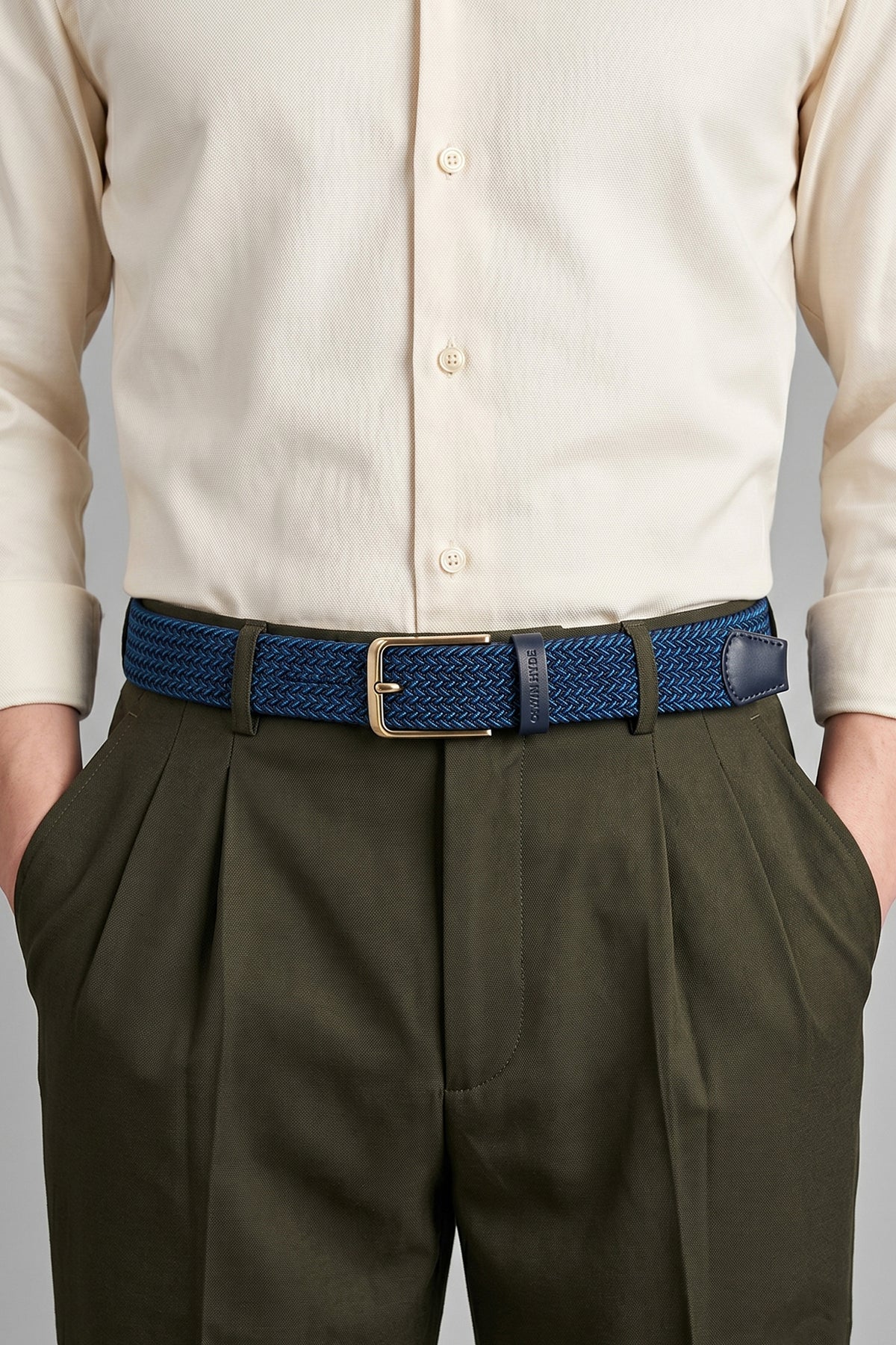 Model wearing Oswin Hyde Bert belt - Rich blue elastic webbing for weddings and smart-casual wear