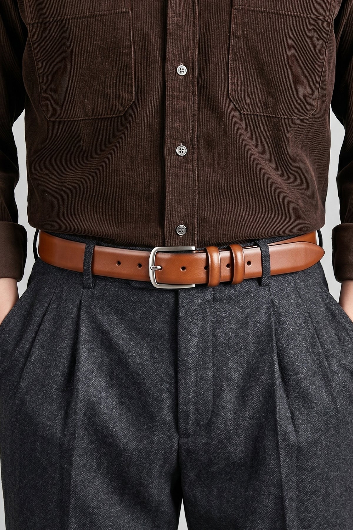 Man wearing Gavin Tan classic leather mens belt featuring a pin buckle and double belt loop, perfect for a polished everyday look.
