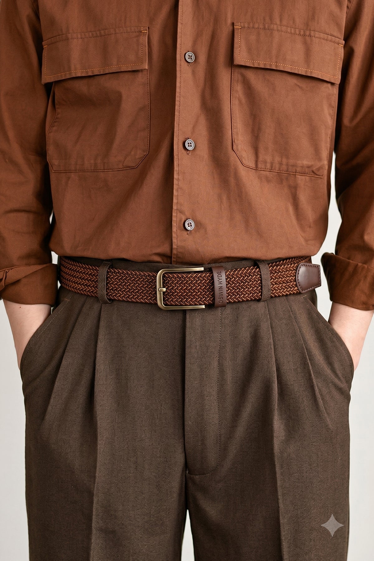 Man wearing Oswin Hyde Bert belt - Rich brown elastic webbing for weddings and smart-casual wear