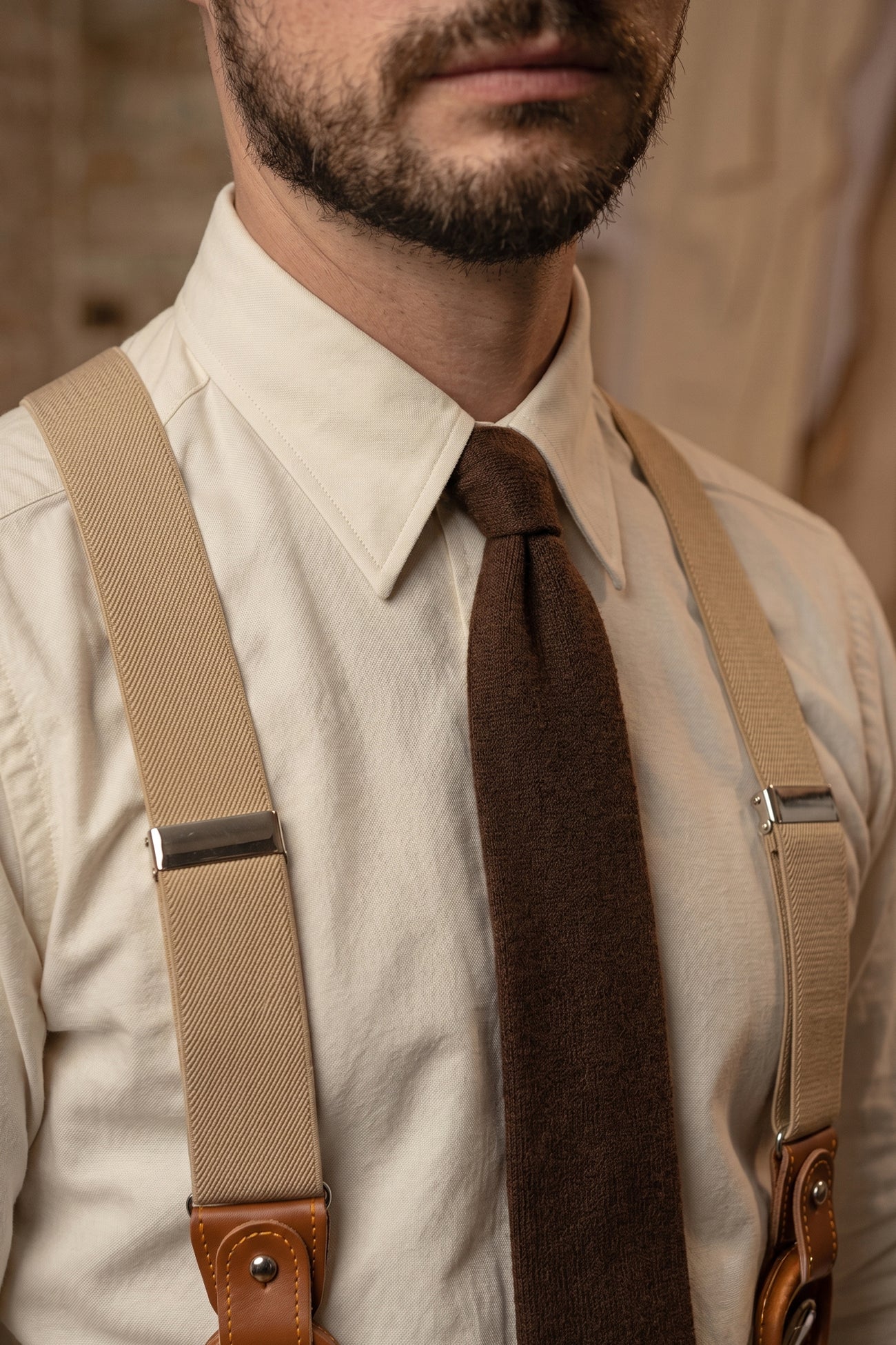 Men’s sand combination braces suspenders with leather accents and adjustable clips, offering a modern yet timeless look for formal and smart-casual wear.