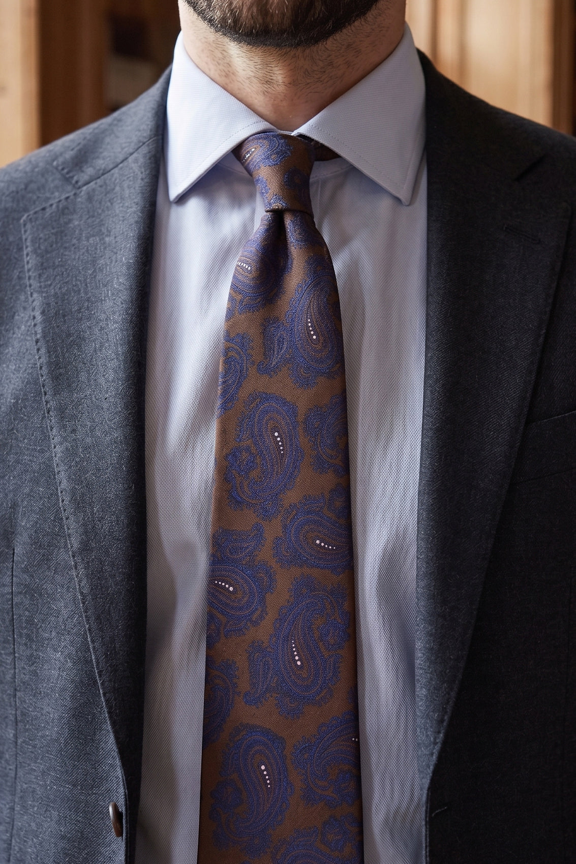 Oswin Hyde Brown Navy Paisley ties for men. The rich blend of brown and navy hues, paired with intricate paisley patterns.