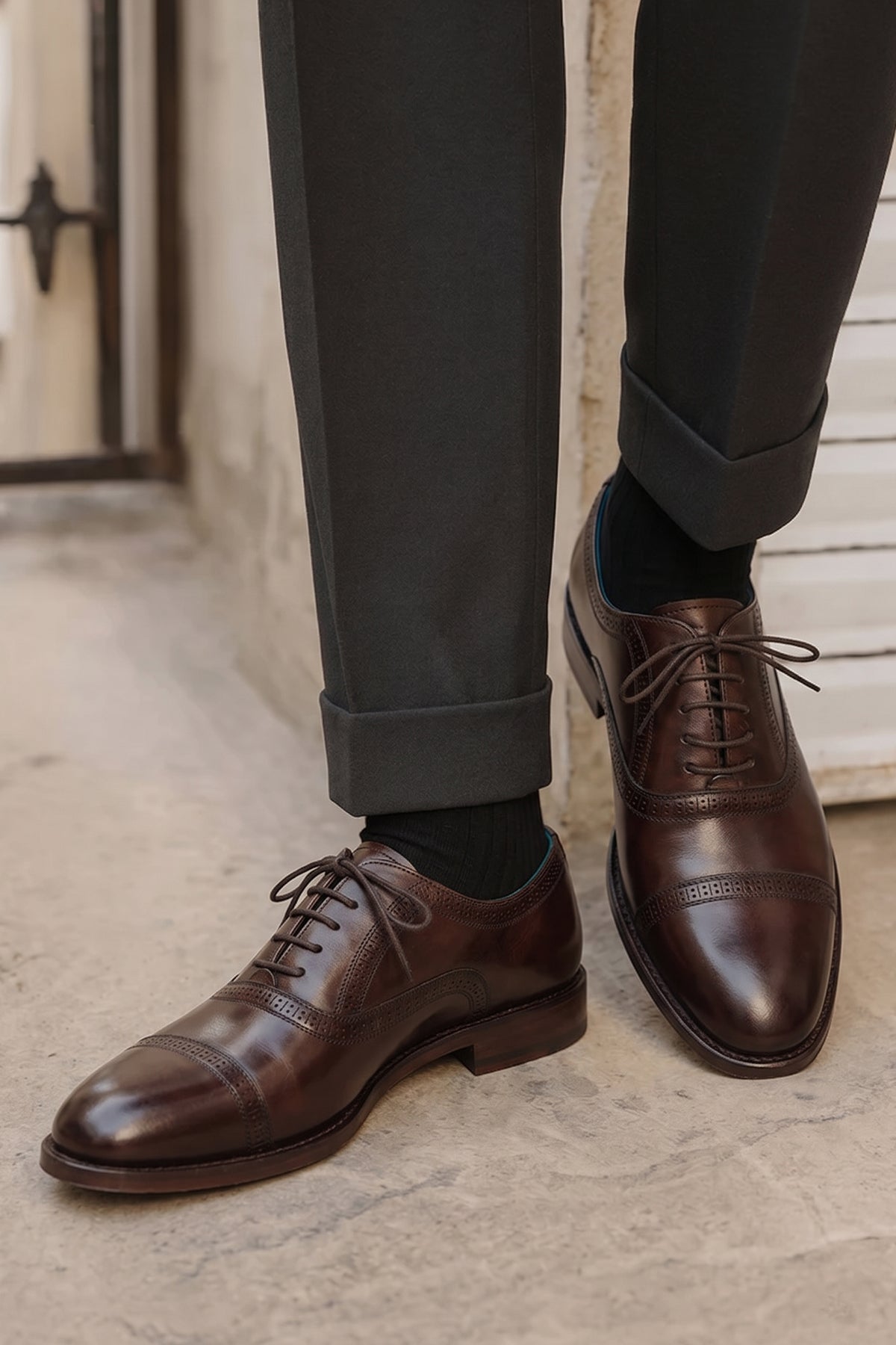 Creed brown men’s leather shoes with timeless five-eyelet toecap brogue design, crafted for elegance and classic sophistication