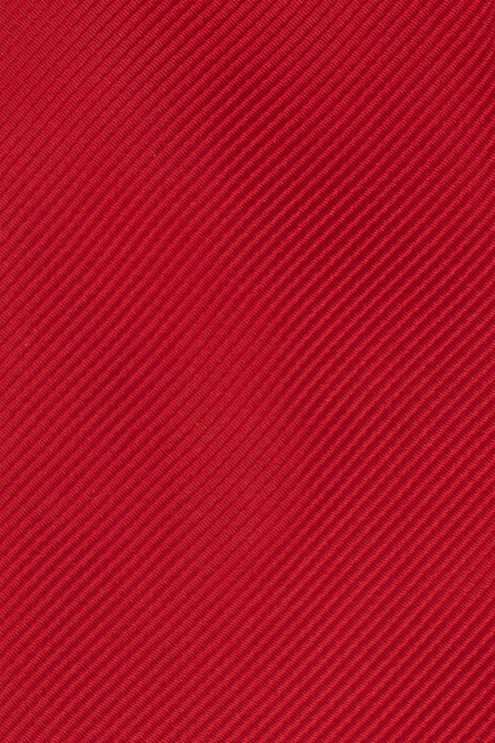 Red Ribbed tie with bold design, ideal for weddings, office wear, and formal occasions.