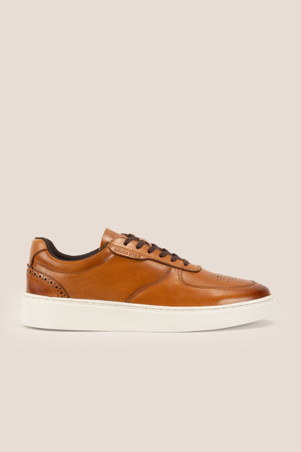 Scout tan leather derby sneakers for men with a sleek design, durable sole, and premium leather finish for casual and smart casual wear.