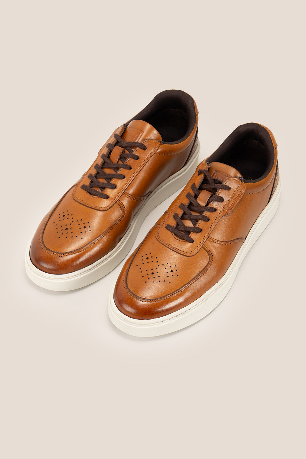 Scout tan leather derby sneakers for men with a sleek design, durable sole, and premium leather finish for casual and smart casual wear.