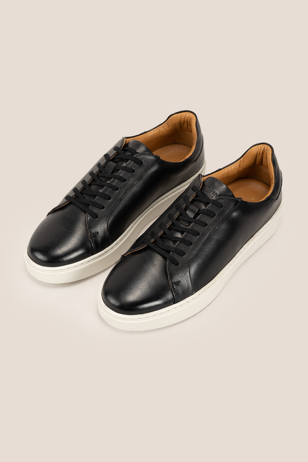 Harris black derby sneakers for men made from premium leather with modern design and casual-smart appeal.