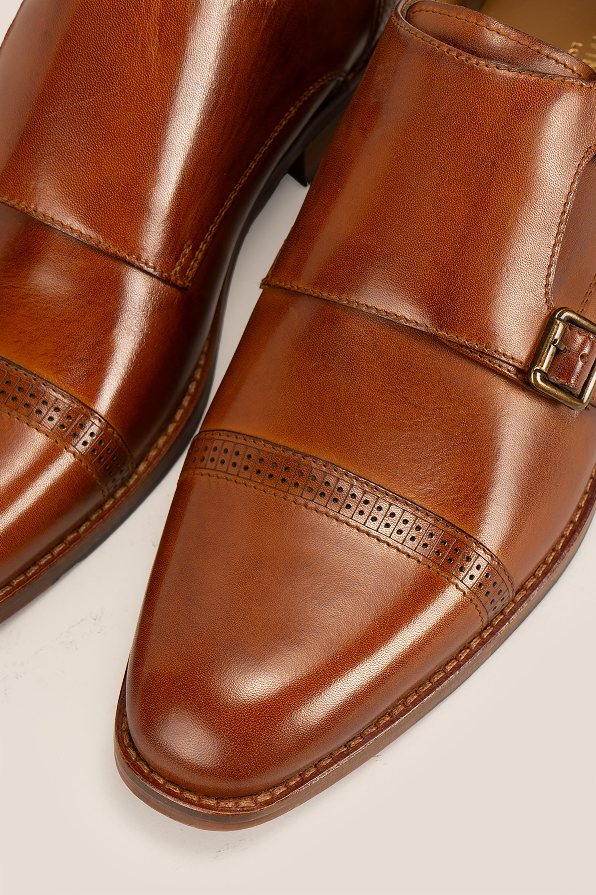 Ernest Tan monk leather men’s shoes with detailed toe cap, crafted from premium tan leather for formal and smart casual wear.