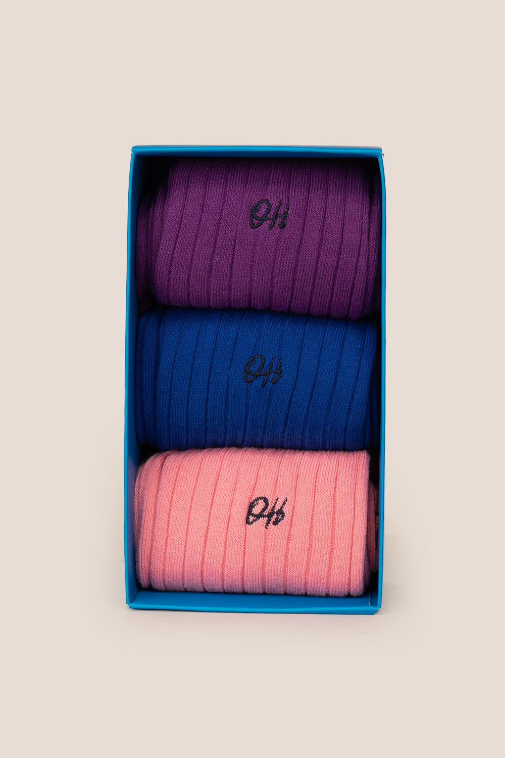 Oswin Hyde Statement three pack socks in purple, blue, and pink for men, offering bold luxury and style.