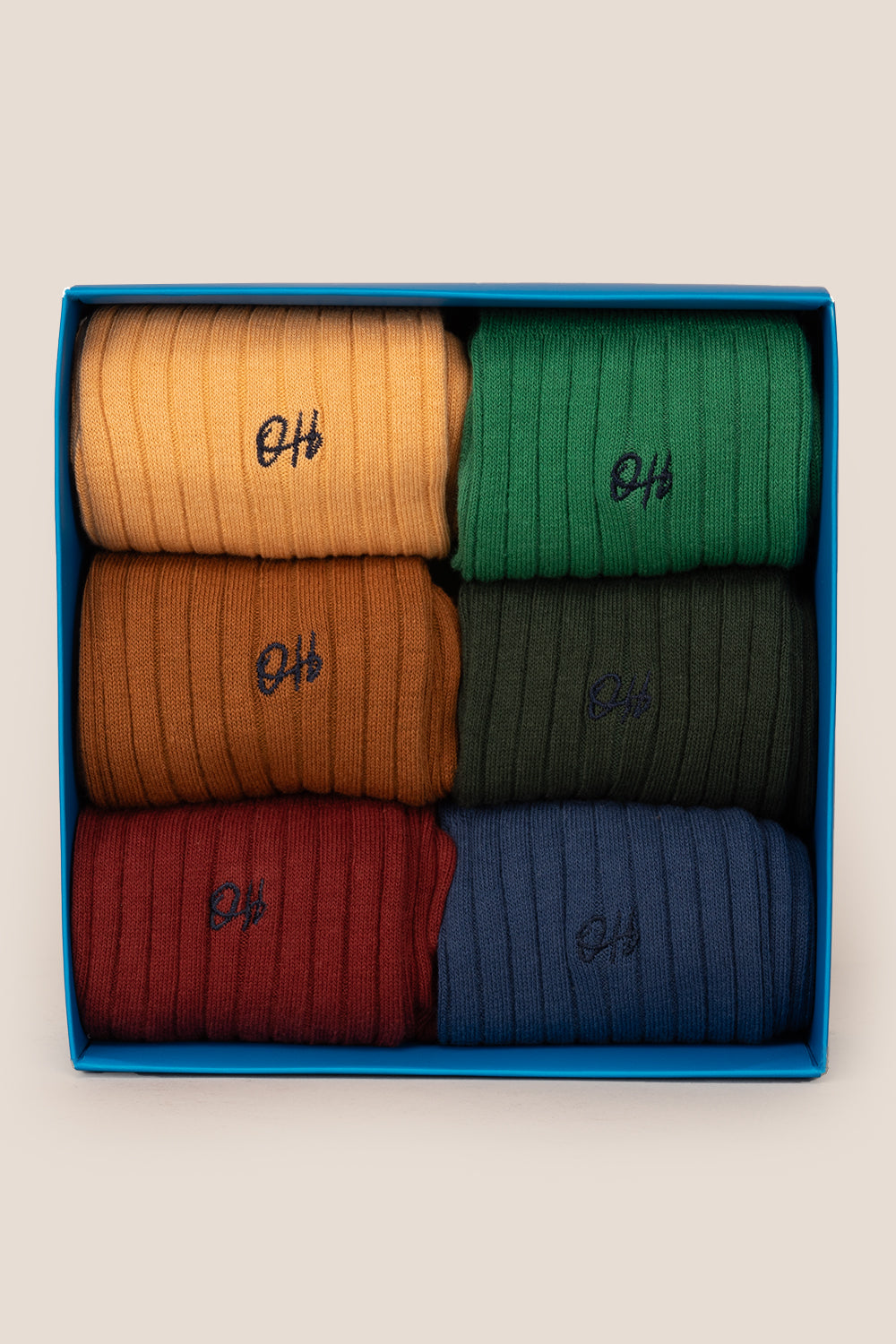 Oswin Hyde Pure Earth six pack socks in brown, green, and blue for men, offering luxury, comfort, and style.