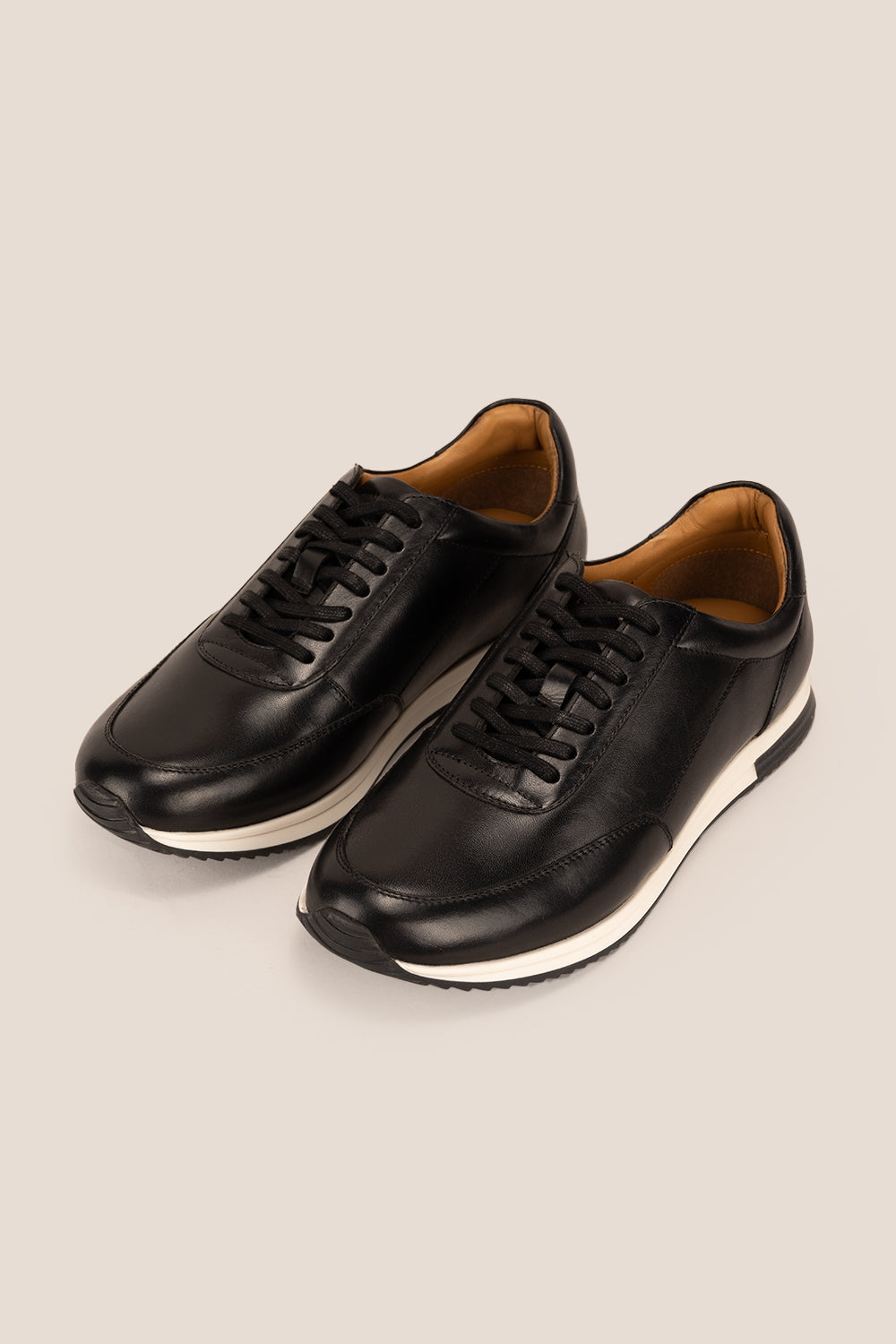 Spencer Black classic men’s sneakers crafted from premium leather, combining style and comfort for casual and smart wear.