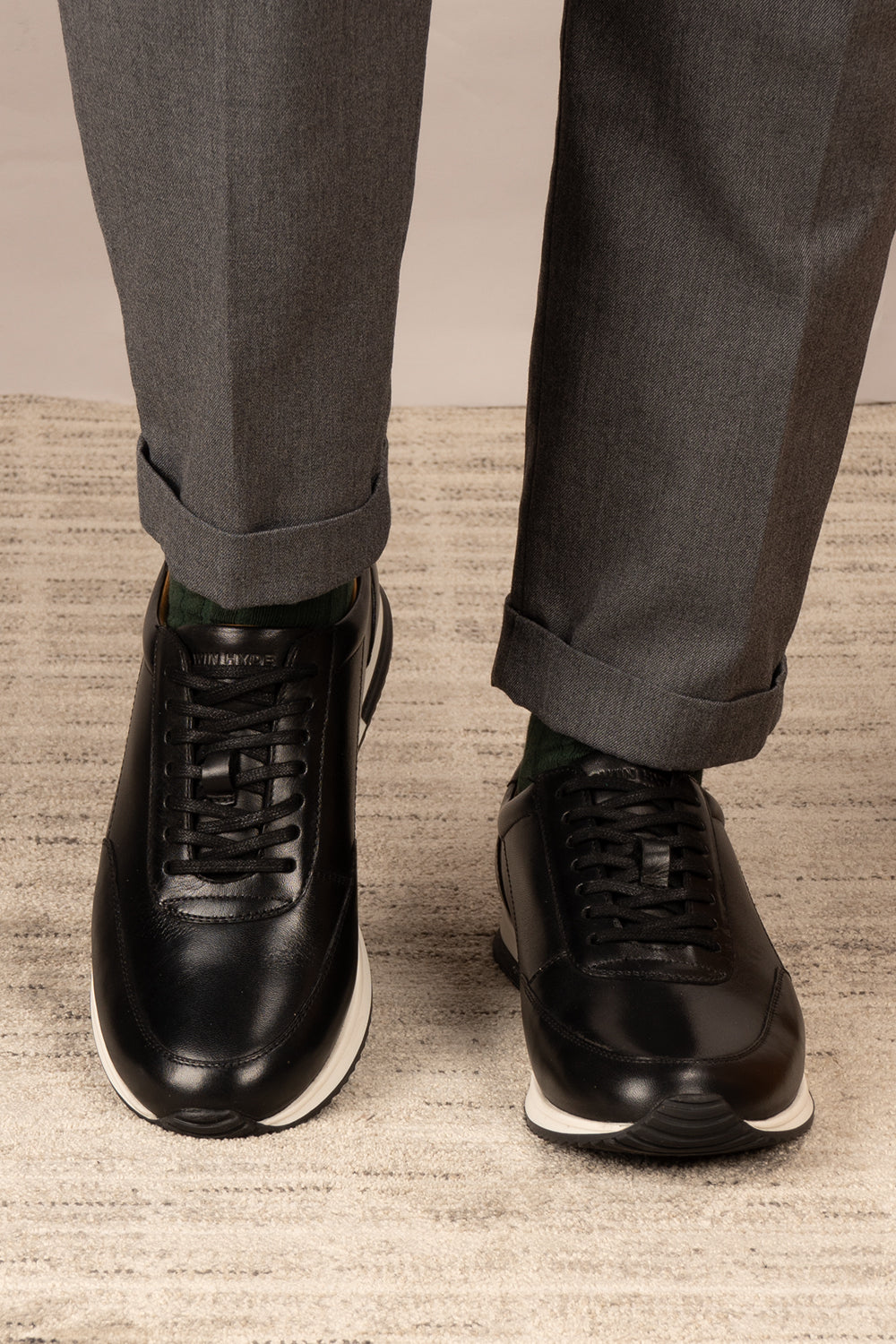 Spencer Black classic men’s sneakers crafted from premium leather, combining style and comfort for casual and smart wear.