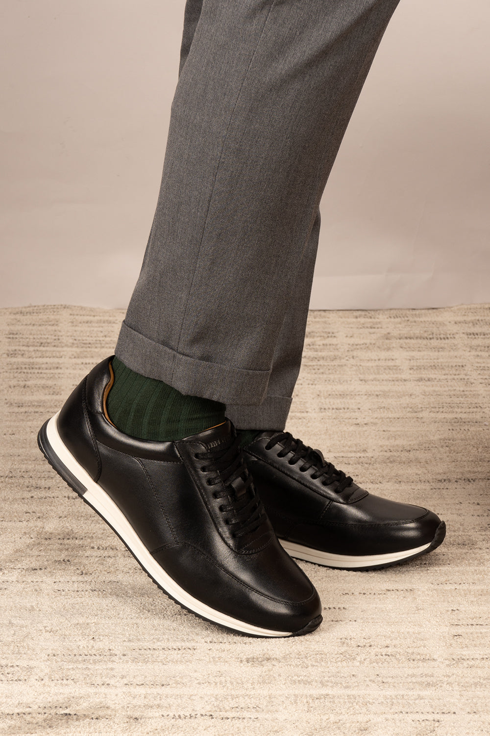 Spencer Black classic men’s sneakers crafted from premium leather, combining style and comfort for casual and smart wear.