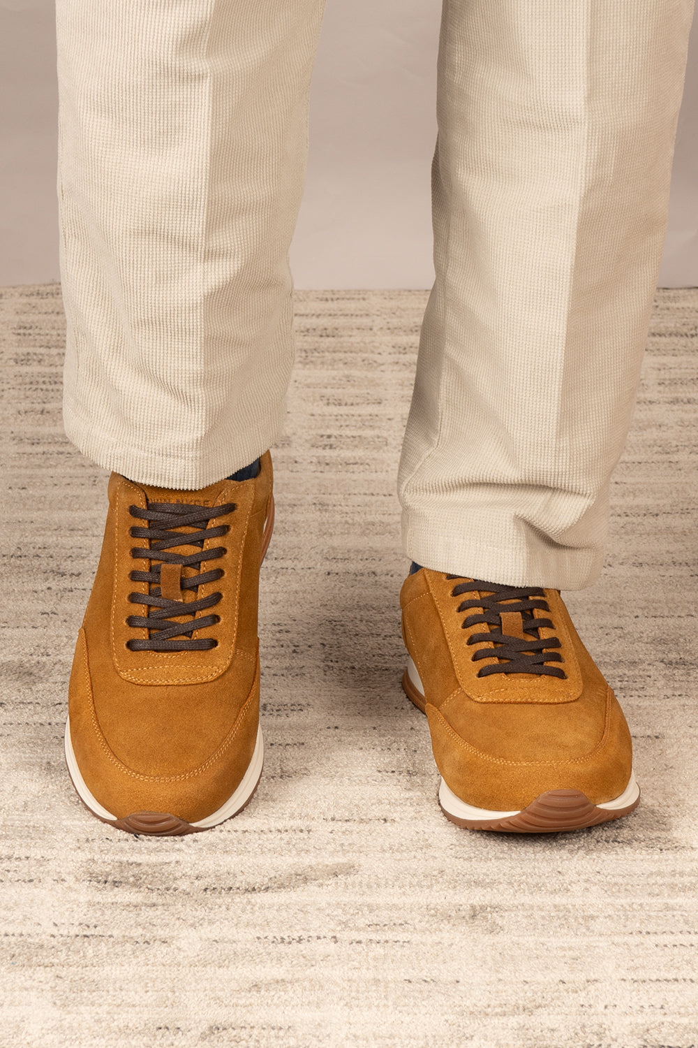 Men’s Spencer tan suede classic sneakers with smooth suede finish, cushioned sole and versatile styling for smart-casual everyday wear.