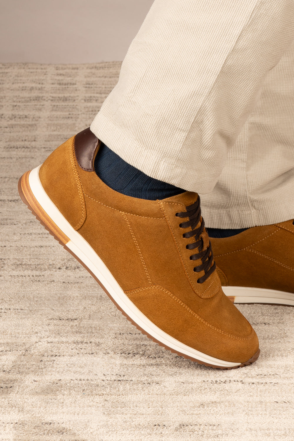 Men’s Spencer tan suede classic sneakers with smooth suede finish, cushioned sole and versatile styling for smart-casual everyday wear.