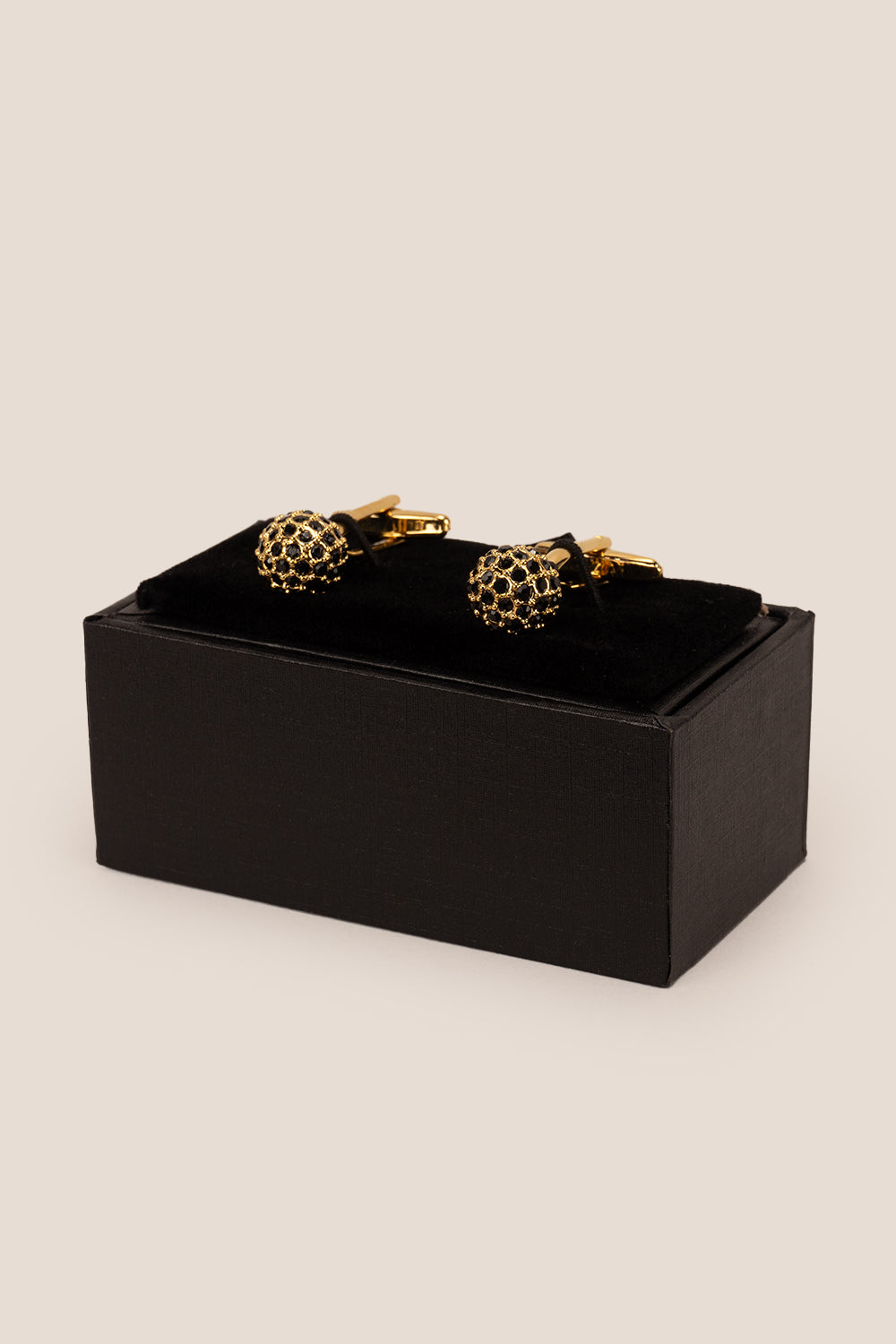 Sphere gold cufflinks with black crystals by Oswin Hyde – luxury men’s formal accessory featuring polished gold finish and elegant crystal inlay.