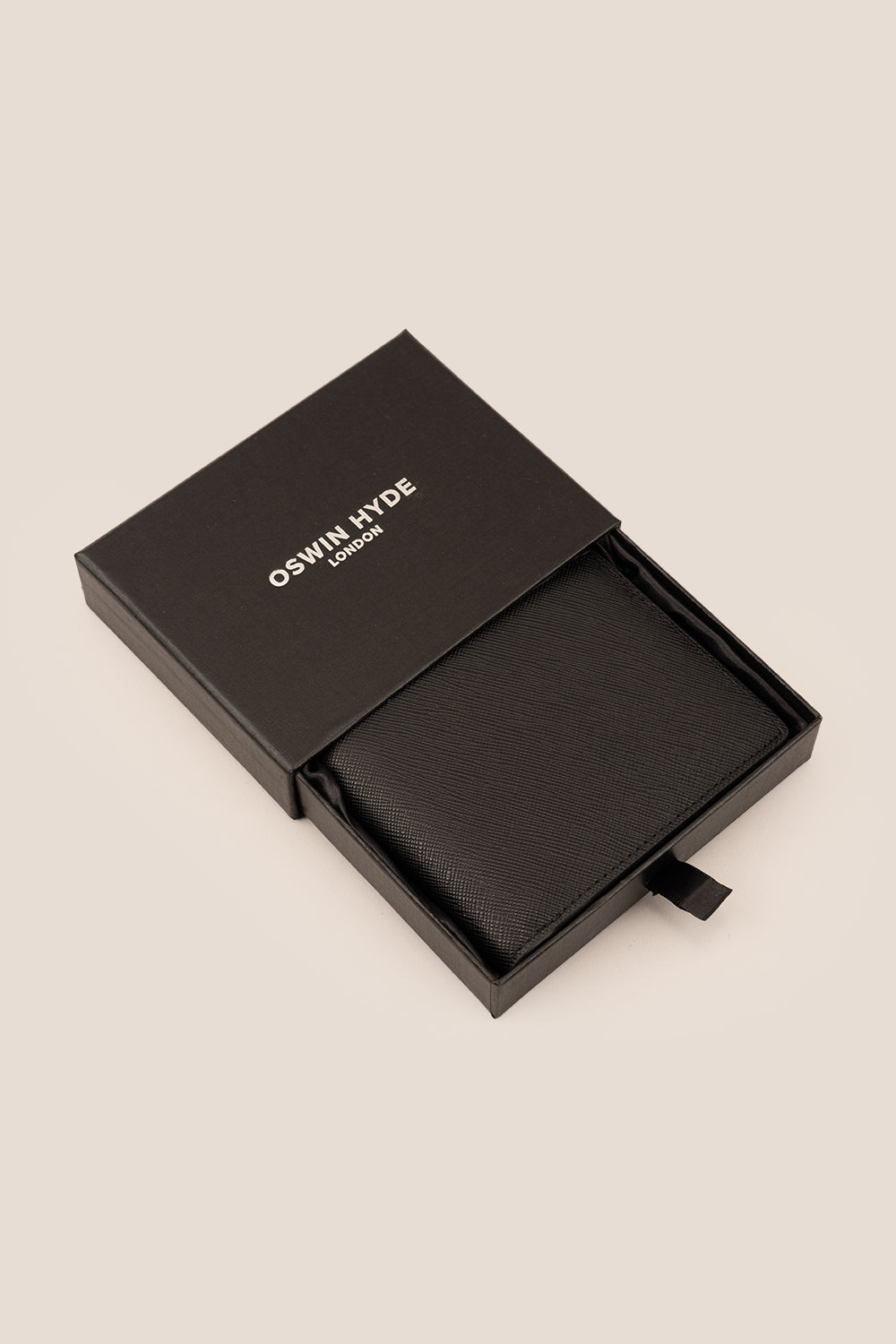 Sloane tan saffiano leather money clip for men by Oswin Hyde – luxury slim design with silver embossing for stylish and practical everyday carry.