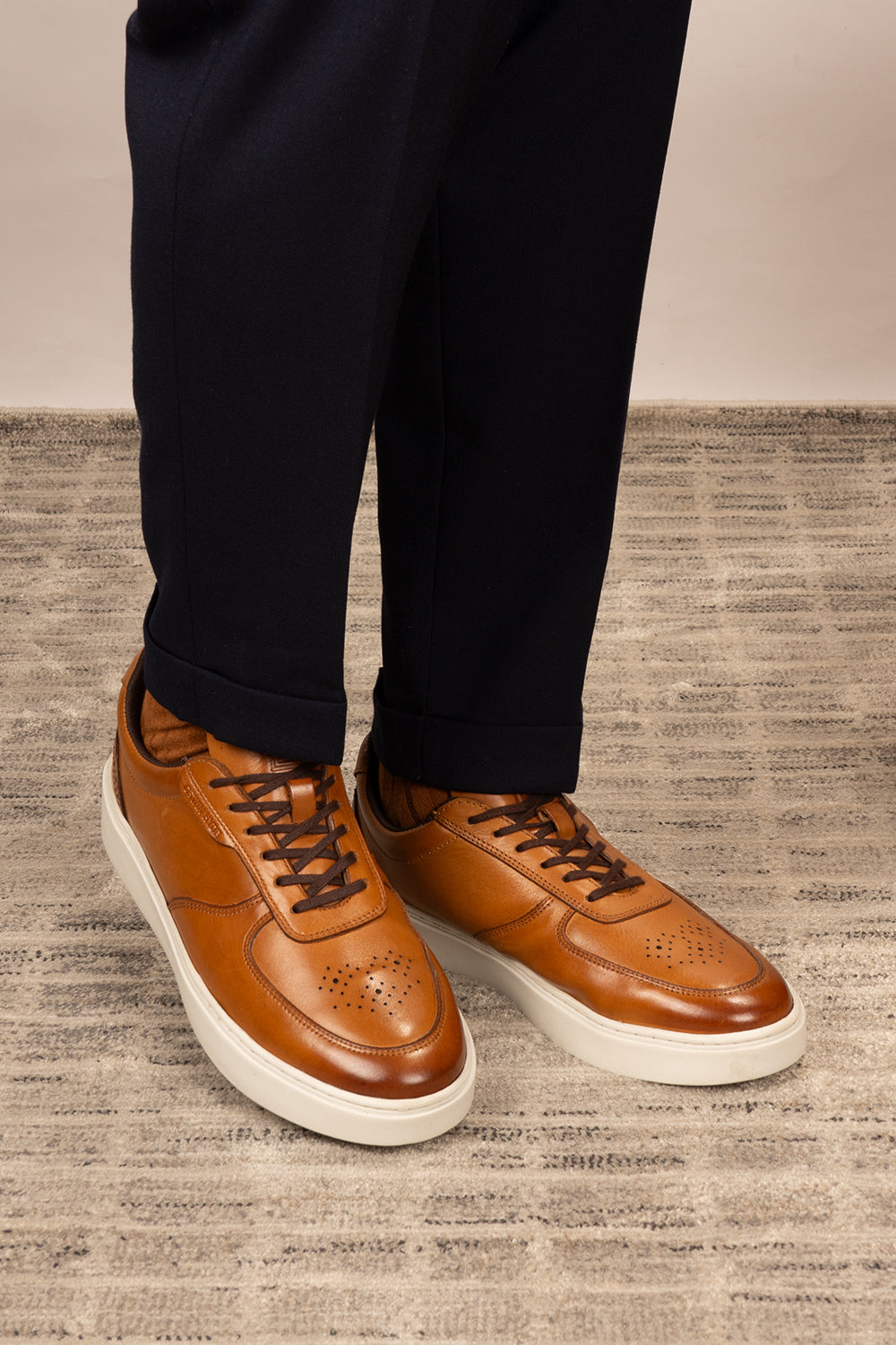 Scout tan leather derby sneakers for men with a sleek design, durable sole, and premium leather finish for casual and smart casual wear.