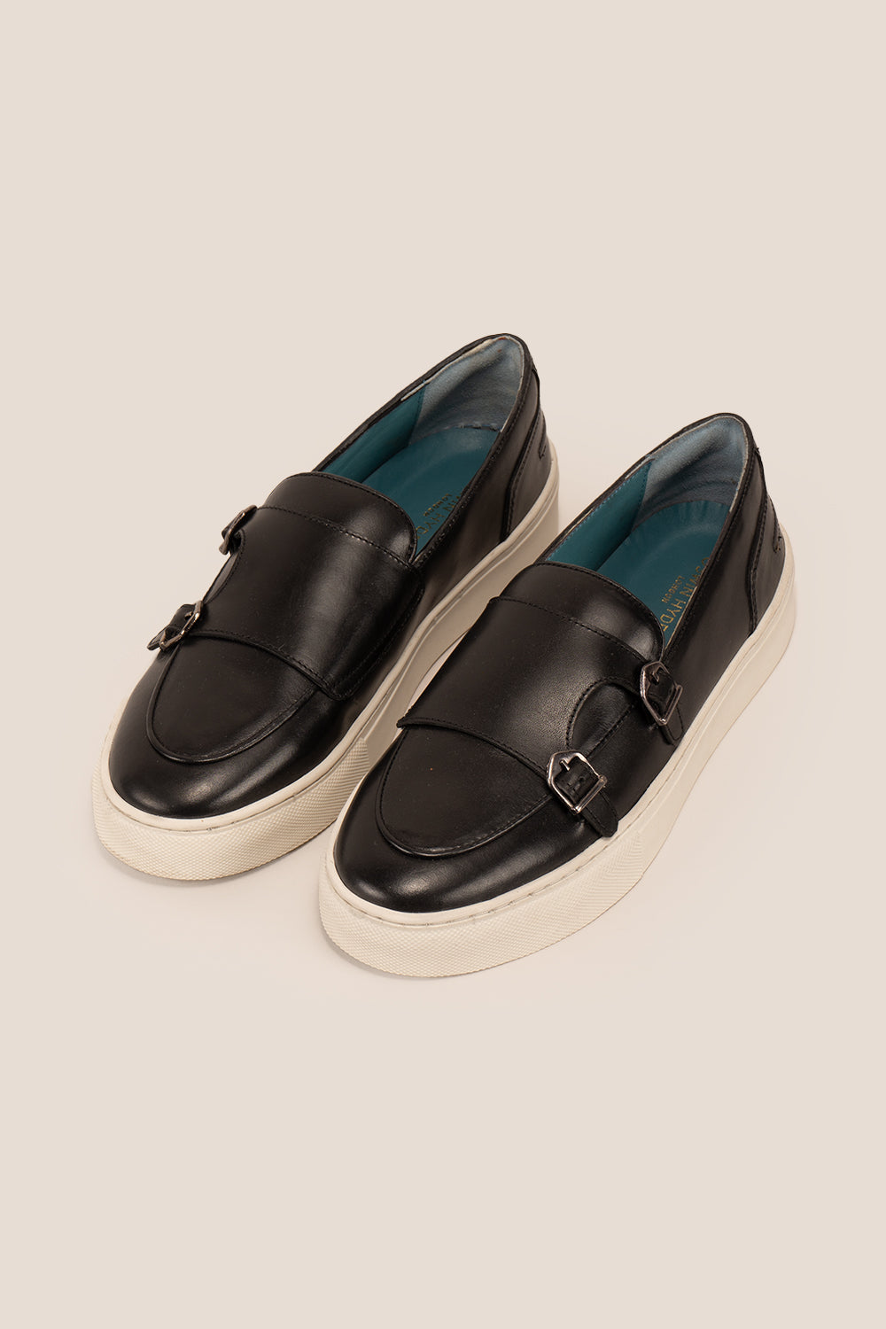 Owen Black monk leather loafers for men, crafted with premium black leather and classic monk strap, ideal for formal and smart casual wear.