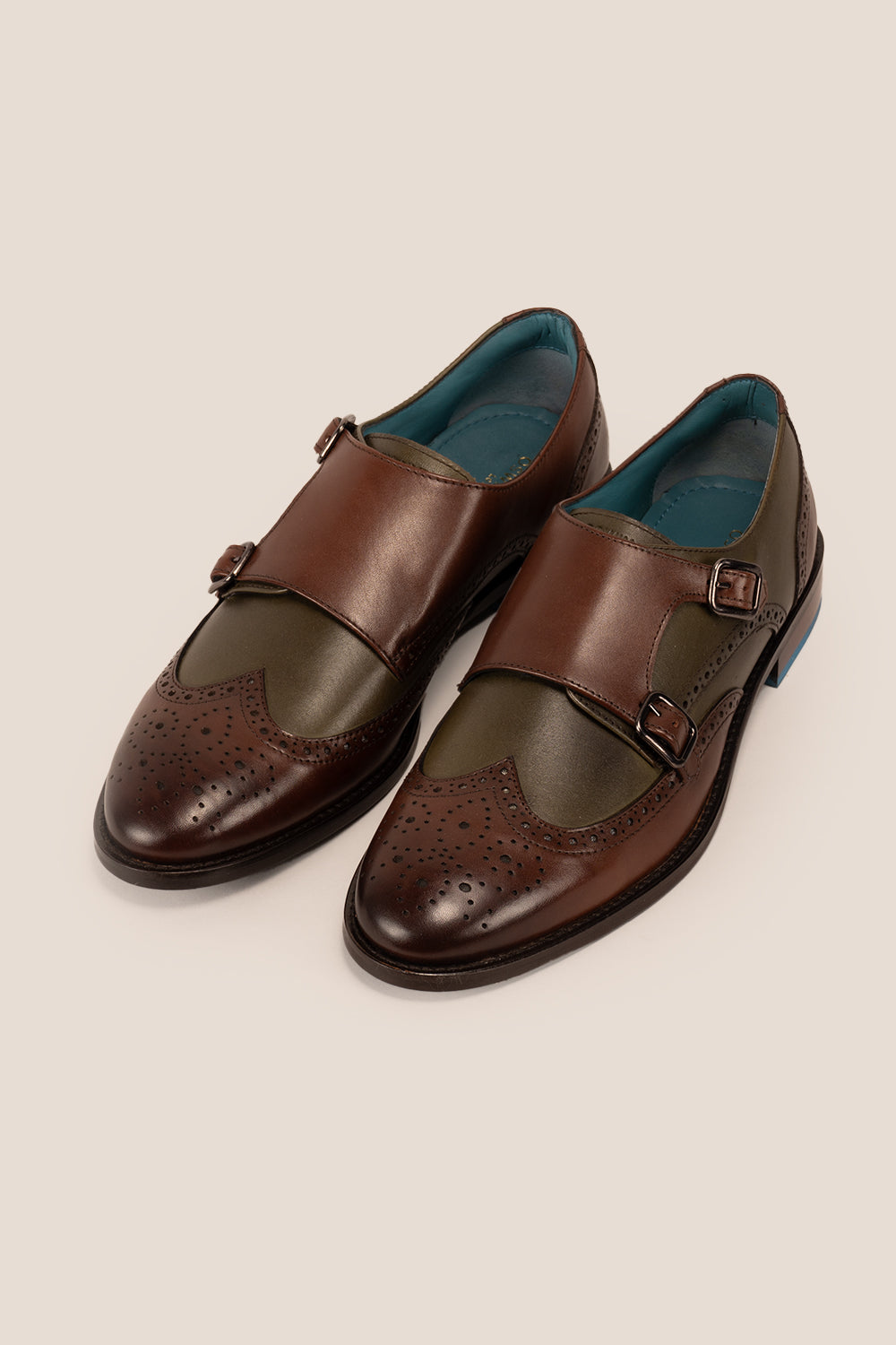 Men’s Warren brown monk strap brogue shoes with wing cap design, crafted in premium leather for formal and smart casual occasions.