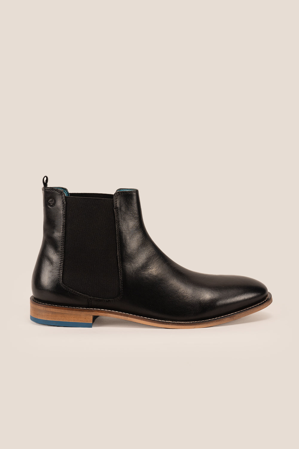 Dennis black leather Chelsea boots for men by Oswin Hyde – luxury slip-on boots with sleek silhouette, elastic sides, and premium formal styling.
