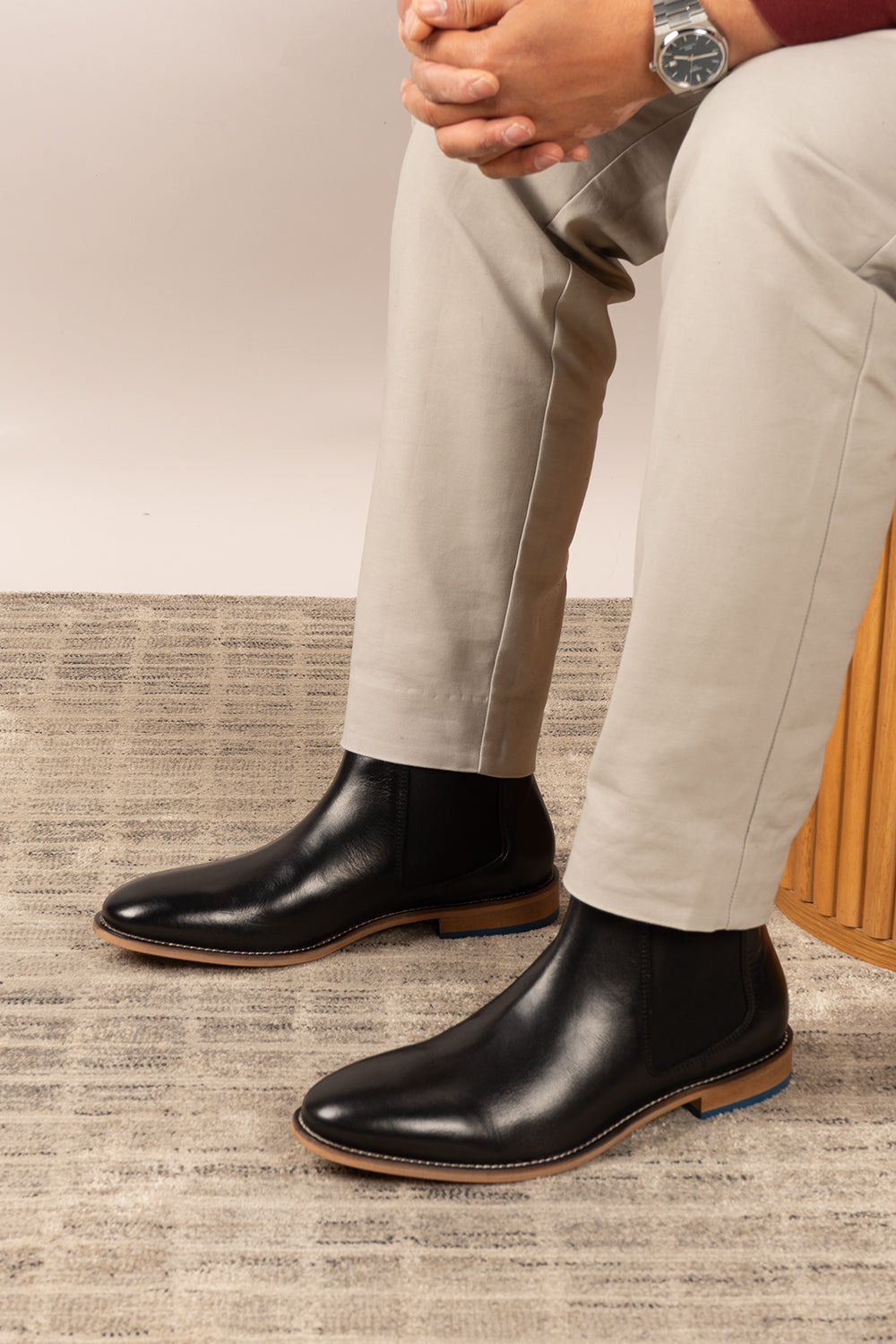 Dennis black leather Chelsea boots for men by Oswin Hyde – luxury slip-on boots with sleek silhouette, elastic sides, and premium formal styling.