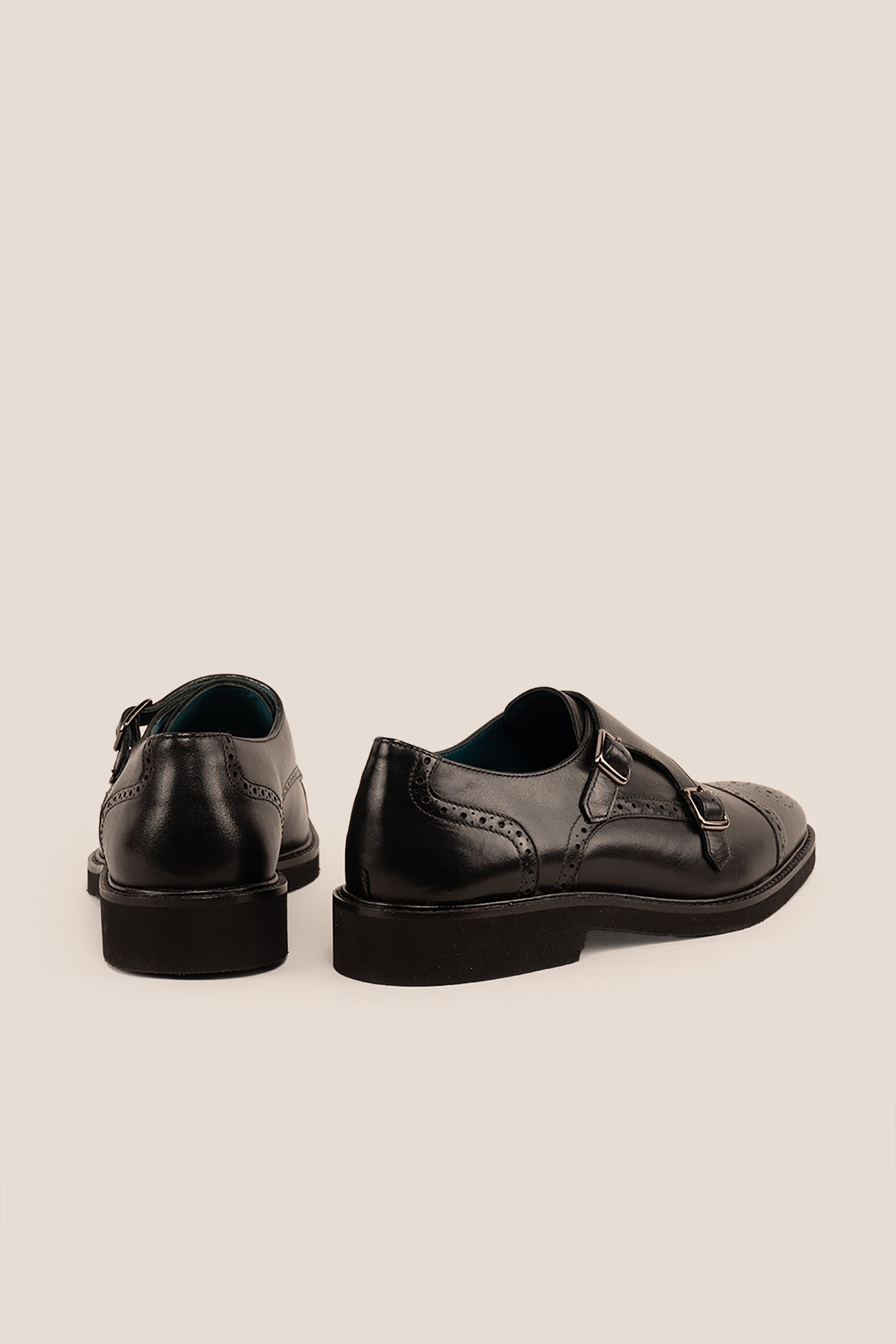 Shelby Black monk strap brogue men’s leather shoes featuring detailed brogue pattern and premium black leather for formal and smart wear.