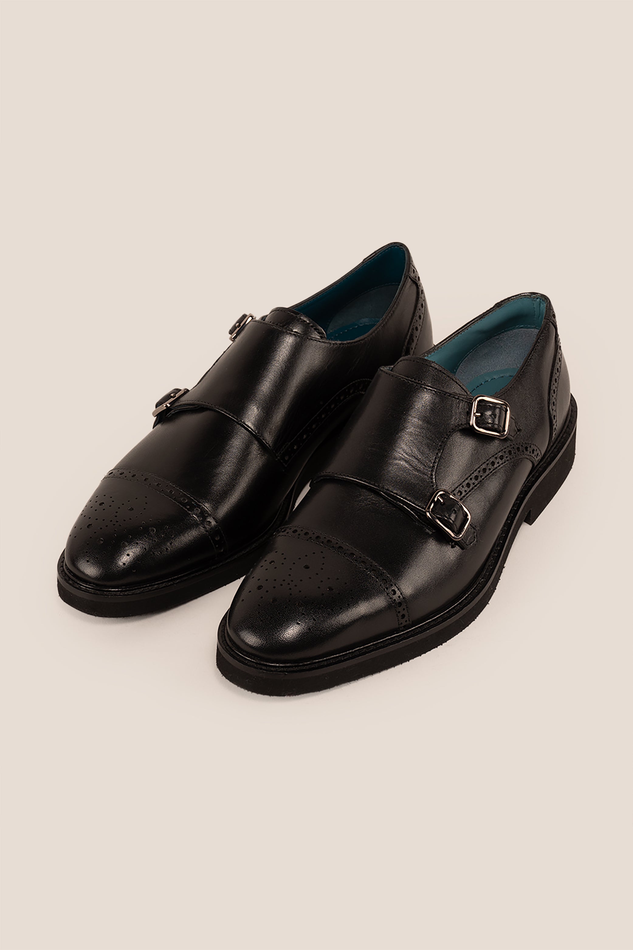 Shelby Black monk strap brogue men’s leather shoes featuring detailed brogue pattern and premium black leather for formal and smart wear.