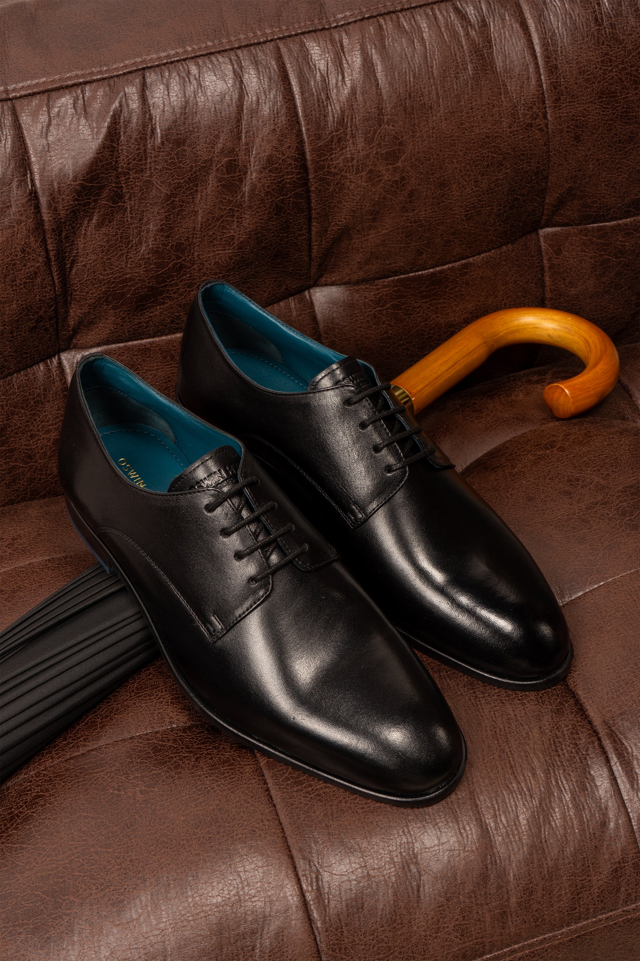 Keyon black men’s derby lace-up leather shoes with classic design, ideal for formal occasions and office wear.