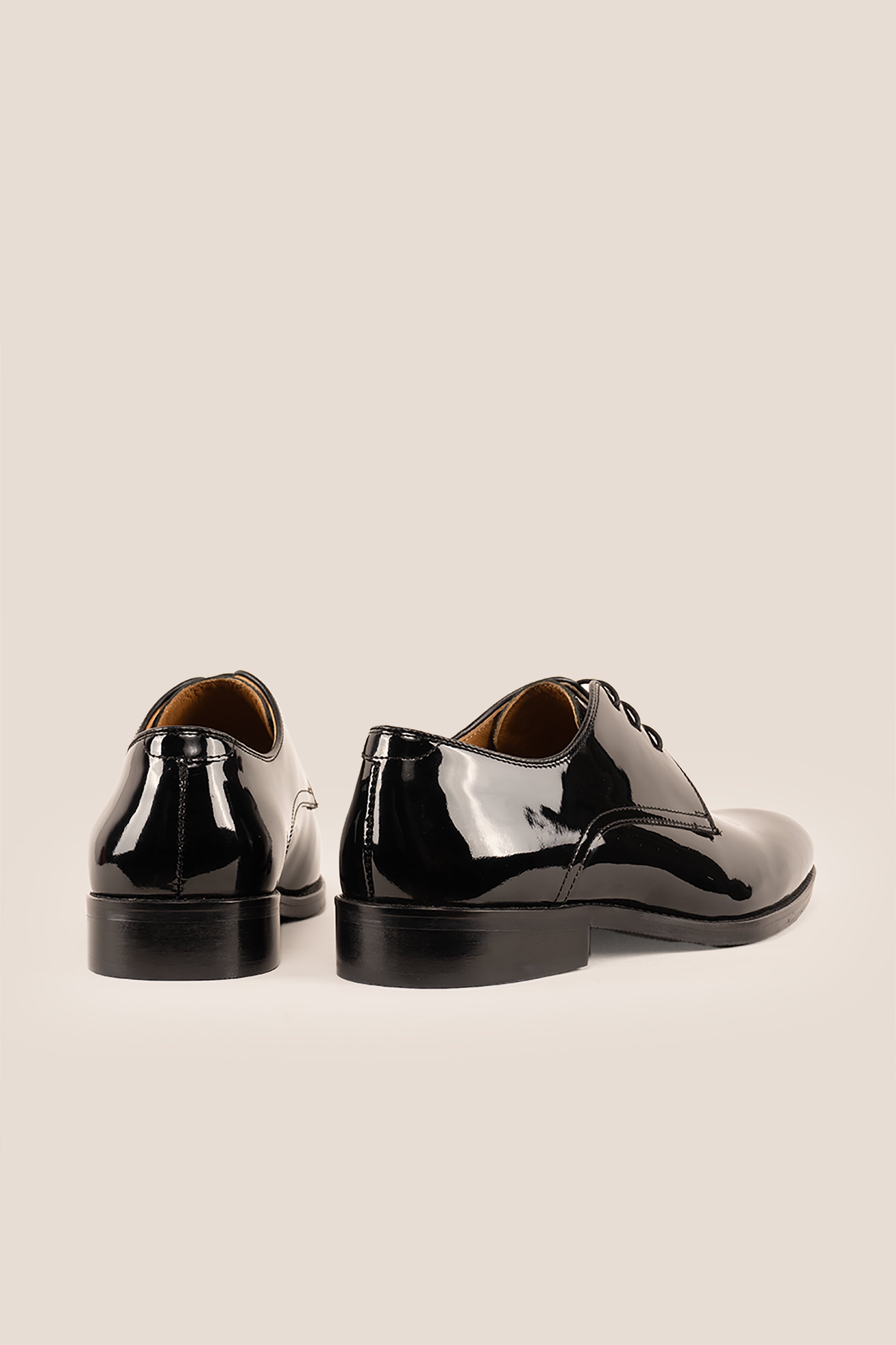 Edison Black patent derby men’s leather shoes with three-eyelet design and polished finish, perfect for formal occasions.