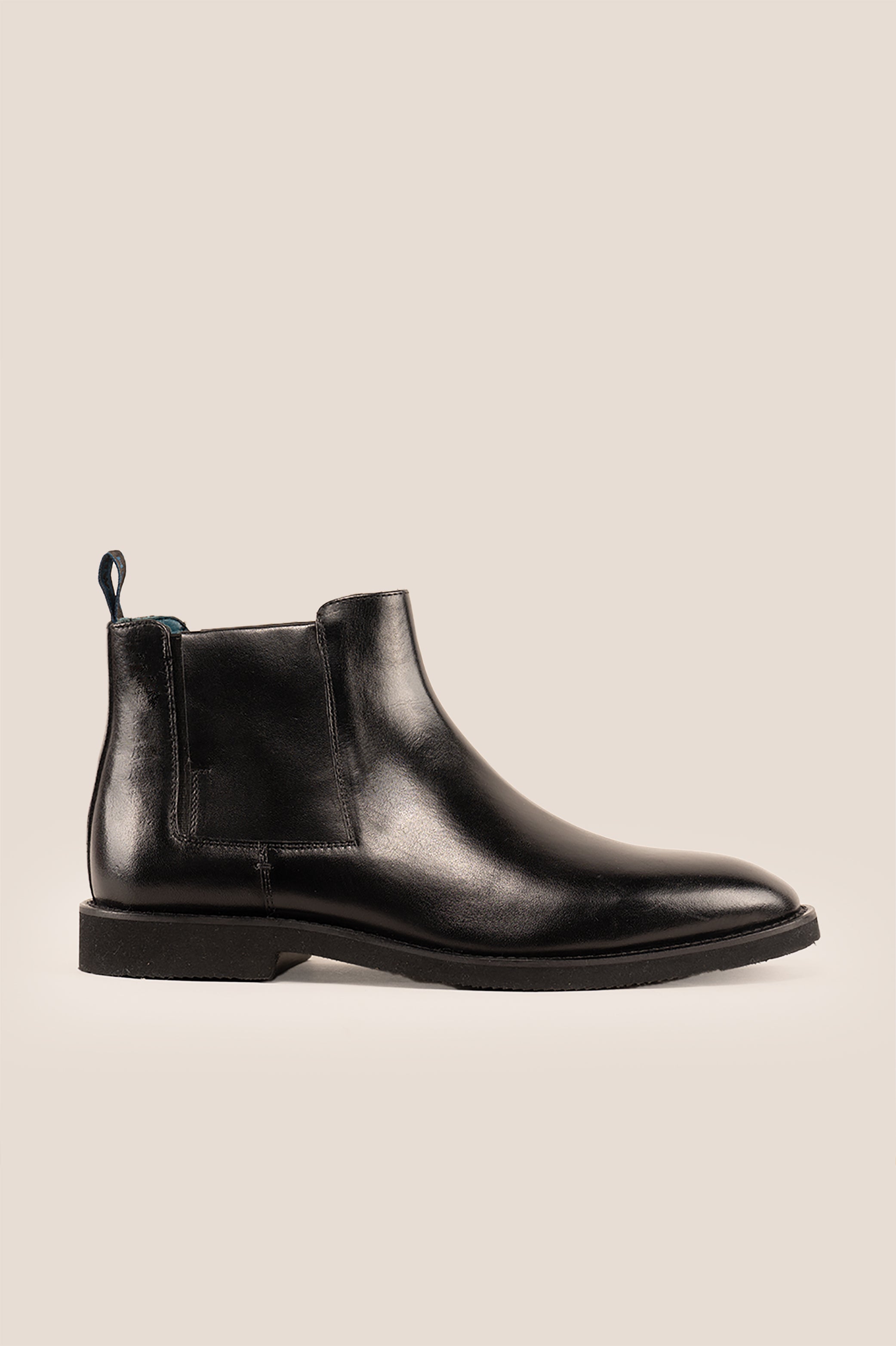 Christopher Black Chelsea boots for men crafted from premium leather with handmade soles, combining luxury, sophistication, and refined style for formal and office wear.