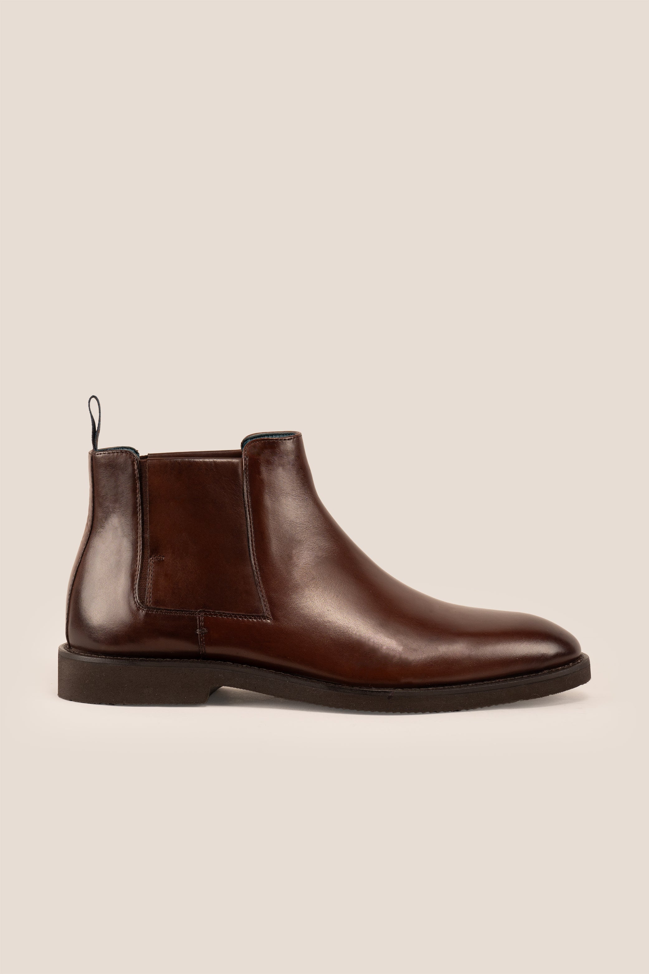 Christopher Brown Chelsea boots for men, crafted from premium leather with handmade soles, offering luxury, refined style, and high-quality craftsmanship.