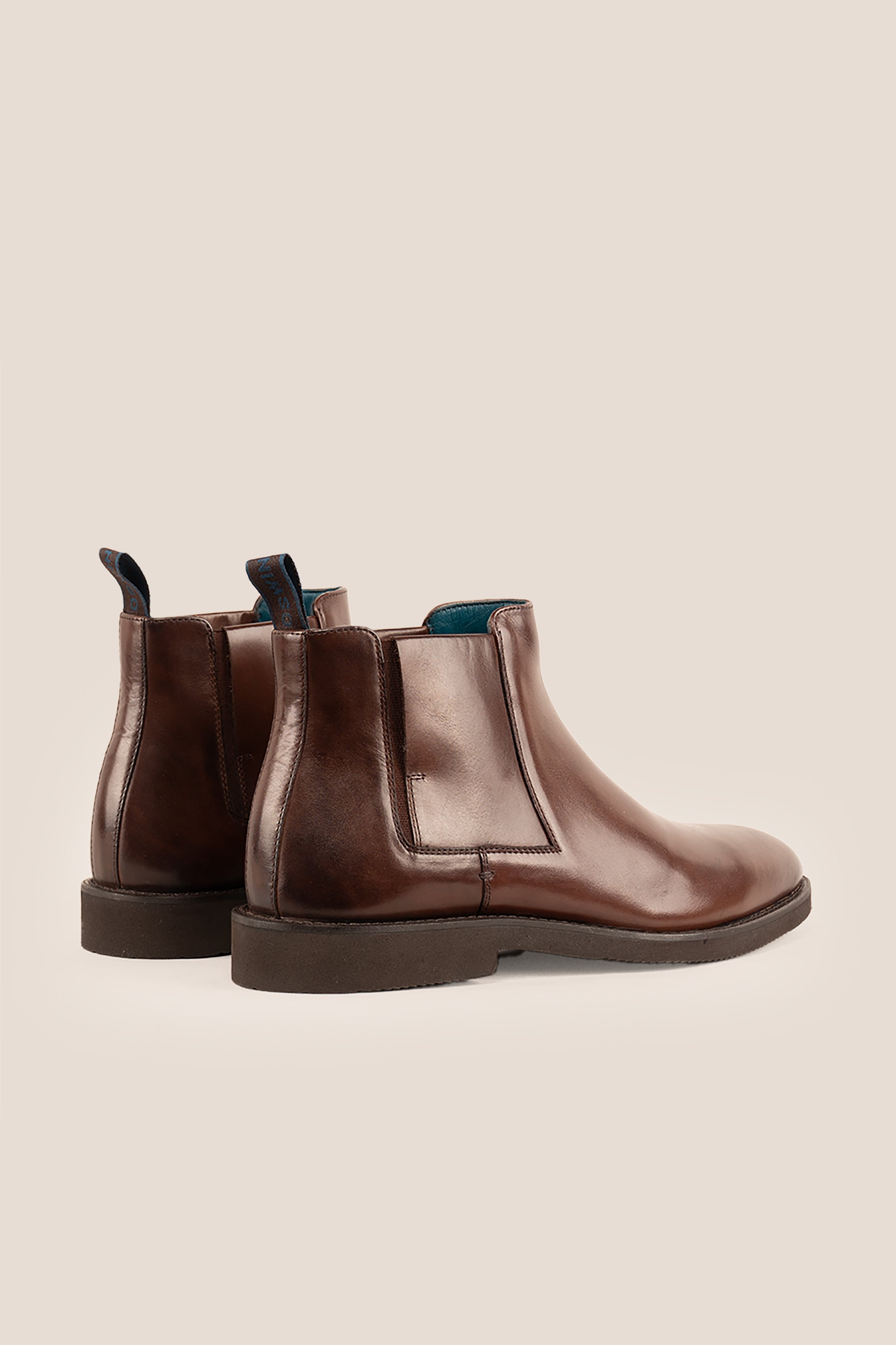 Christopher Brown Chelsea boots for men, crafted from premium leather with handmade soles, offering luxury, refined style, and high-quality craftsmanship.