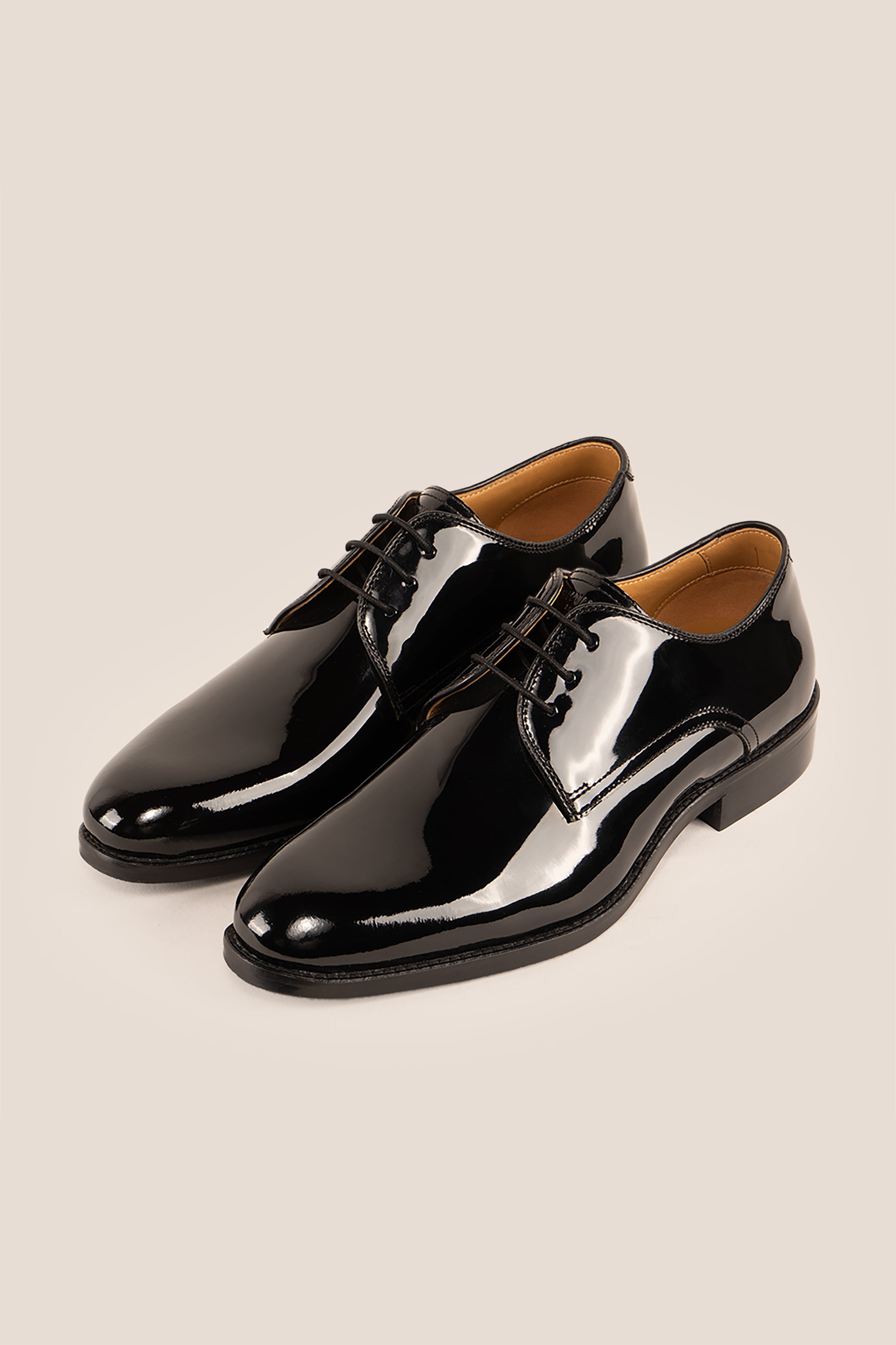 Edison Black patent derby men’s leather shoes with three-eyelet design and polished finish, perfect for formal occasions.