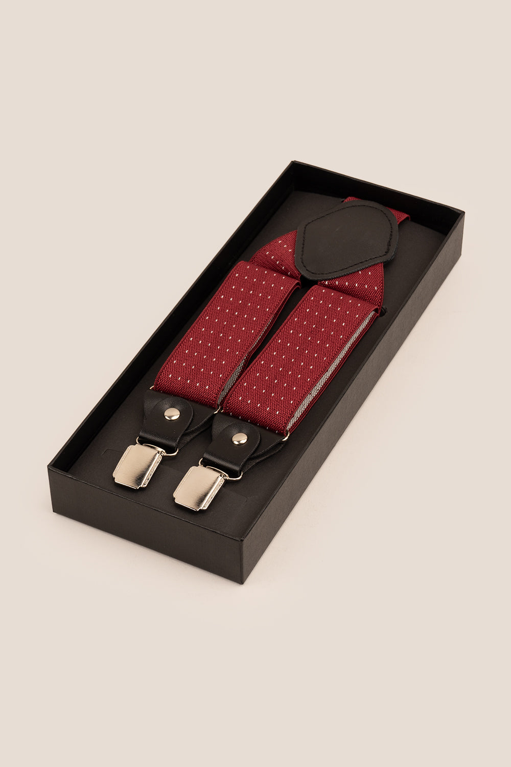 Men’s red polka dot clip-on braces with elastic straps and secure metal clips, ideal for weddings, business attire, or stylish everyday looks.