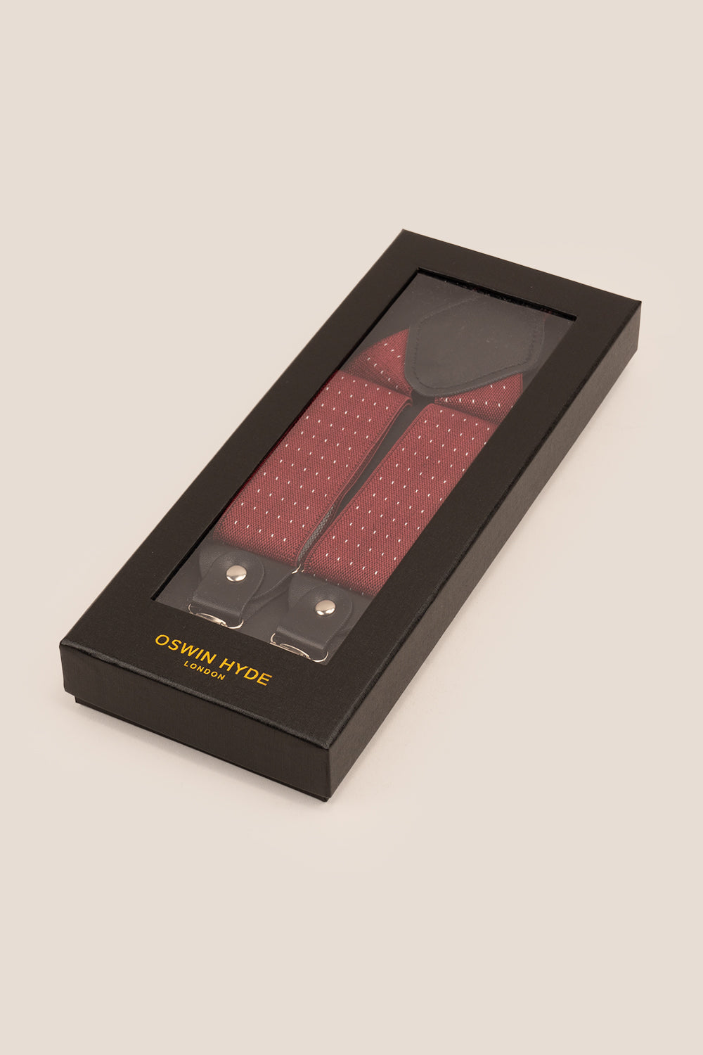 Men’s red polka dot clip-on braces with elastic straps and secure metal clips, ideal for weddings, business attire, or stylish everyday looks.