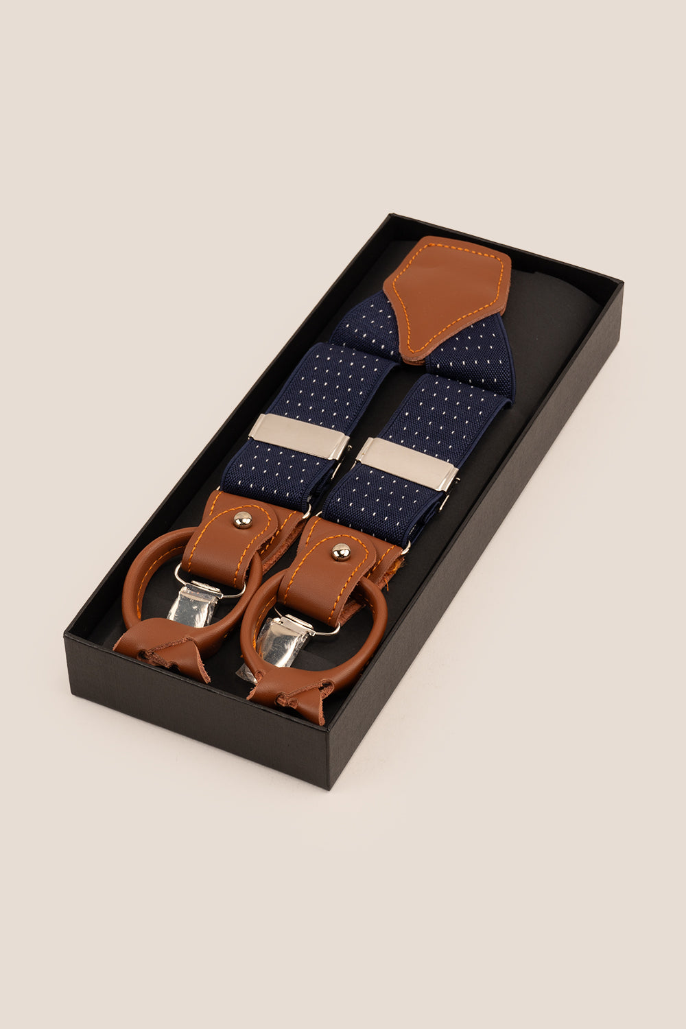 Men’s navy polka dot combination braces suspenders with leather ends and secure metal clips, suited for weddings, business or smart-casual outfits.