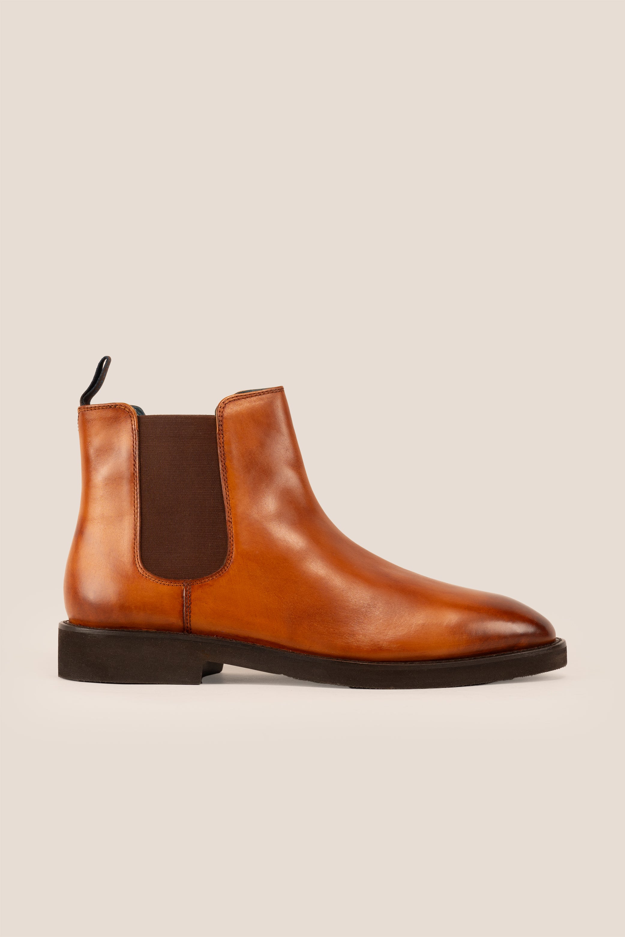 Michael tan leather Chelsea boots for men with elastic sides and pull tab, perfect for smart-casual and formal wear.