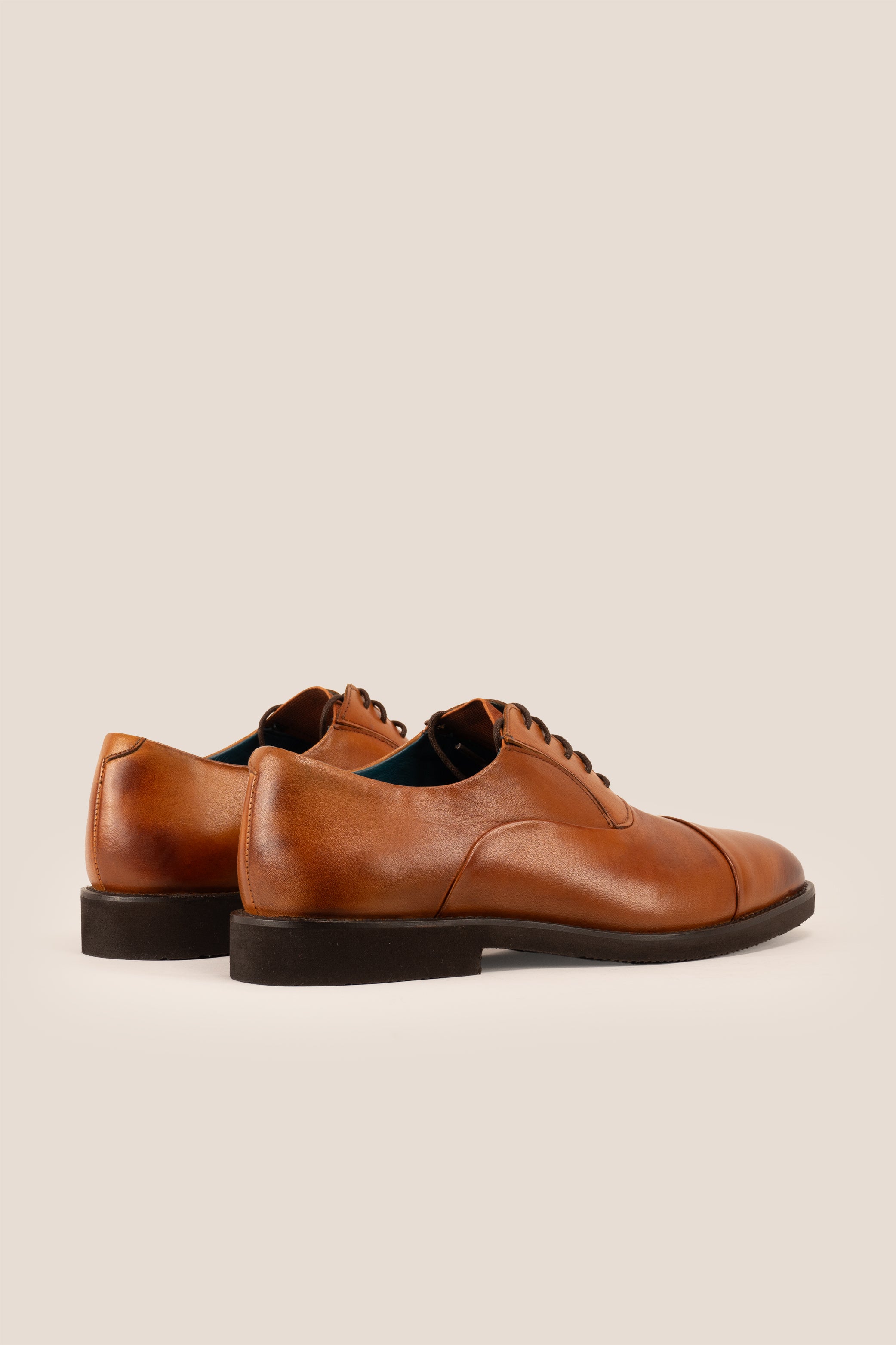 Grayson tan Derby leather shoes for men featuring five eyelets, smooth finish, classic round toe, and stitched leather sole—perfect for smart occasions.