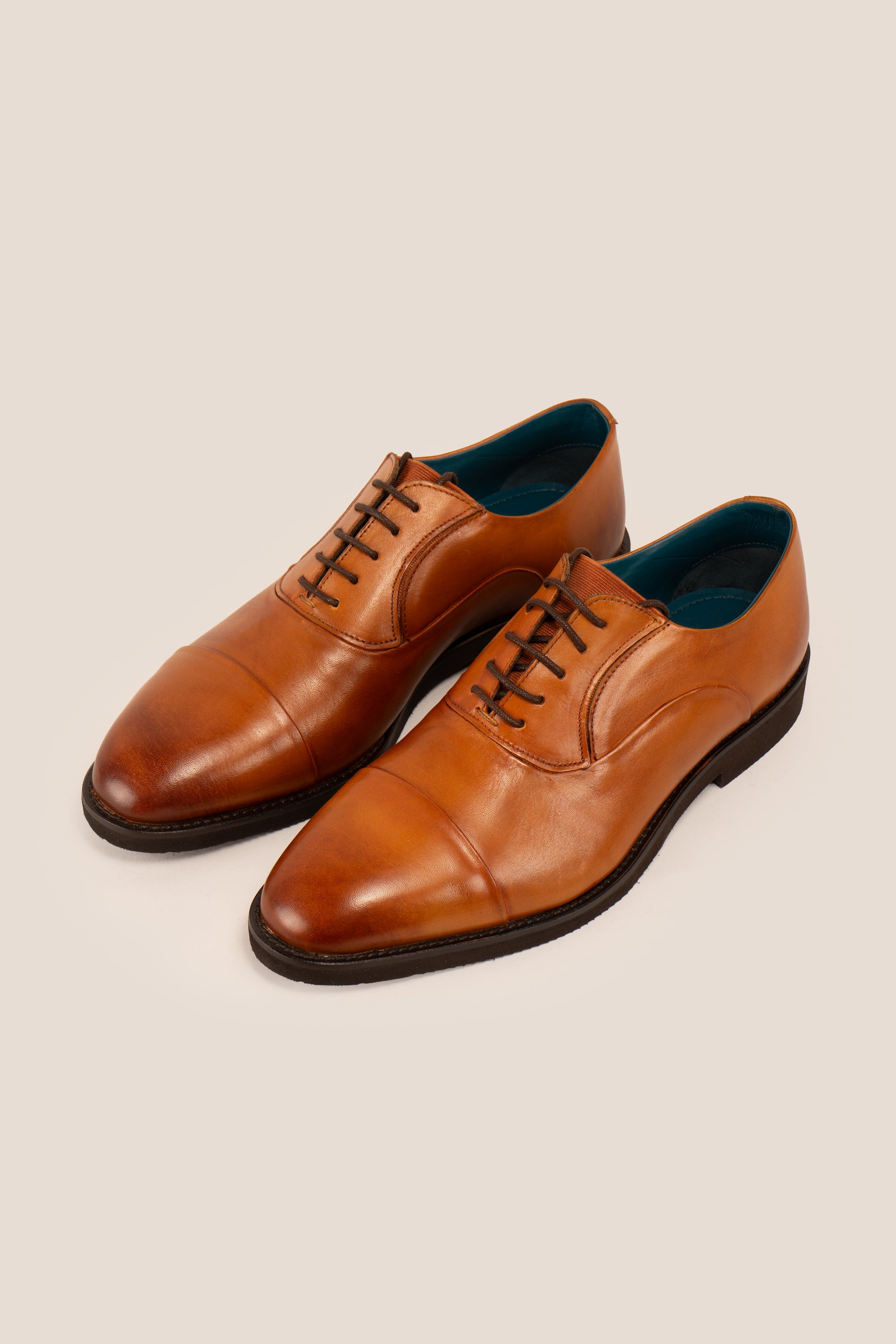 Grayson tan Derby leather shoes for men featuring five eyelets, smooth finish, classic round toe, and stitched leather sole—perfect for smart occasions.