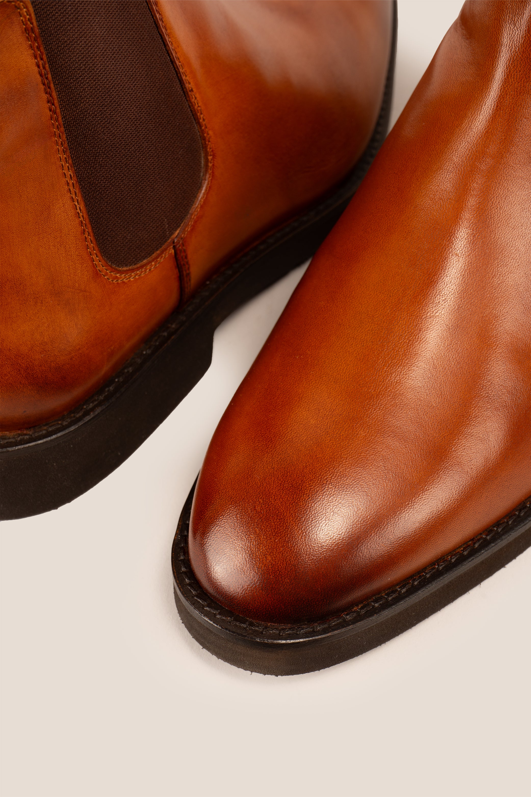 Michael tan leather Chelsea boots for men with elastic sides and pull tab, perfect for smart-casual and formal wear.