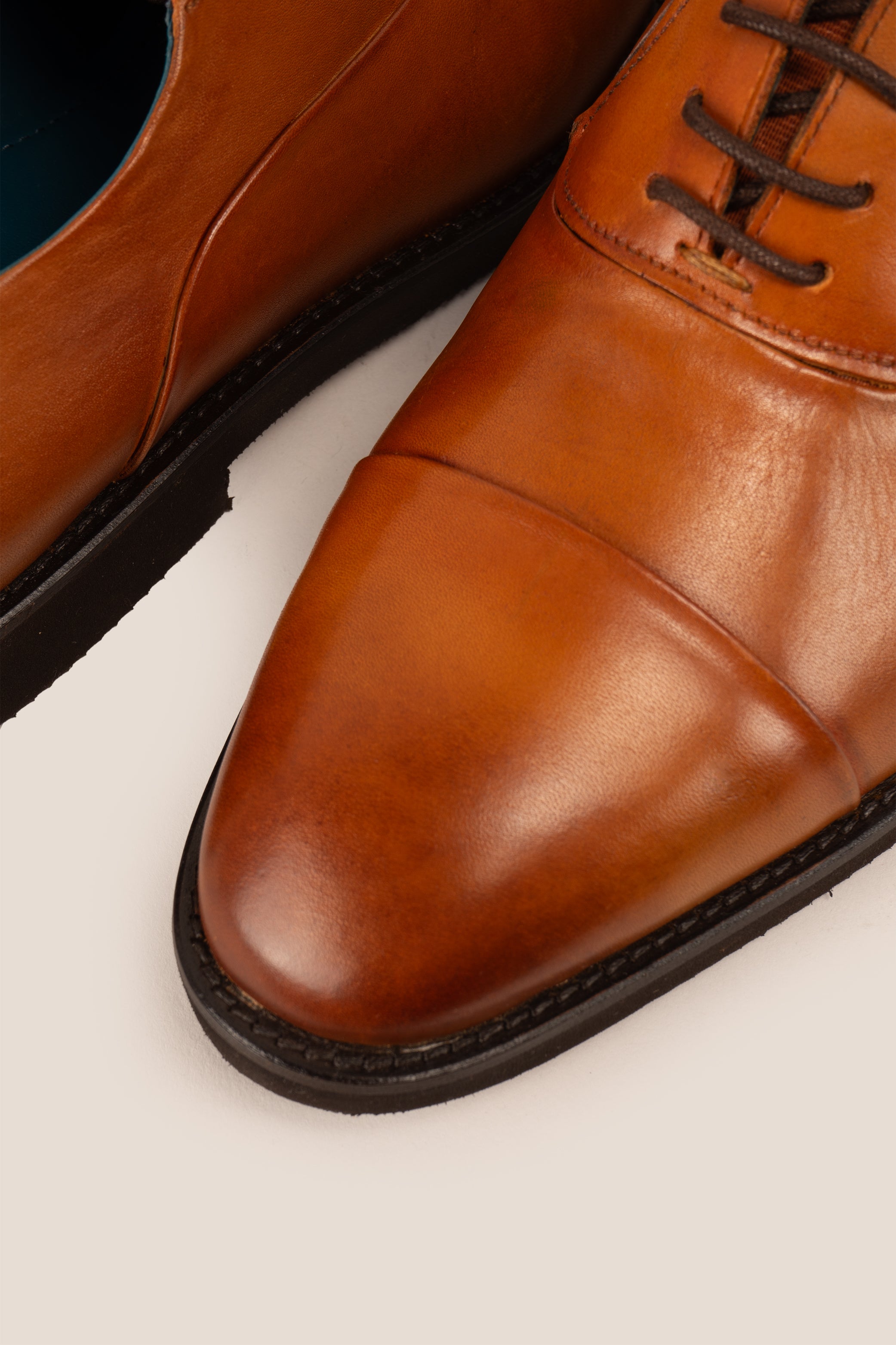 Grayson tan Derby leather shoes for men featuring five eyelets, smooth finish, classic round toe, and stitched leather sole—perfect for smart occasions.