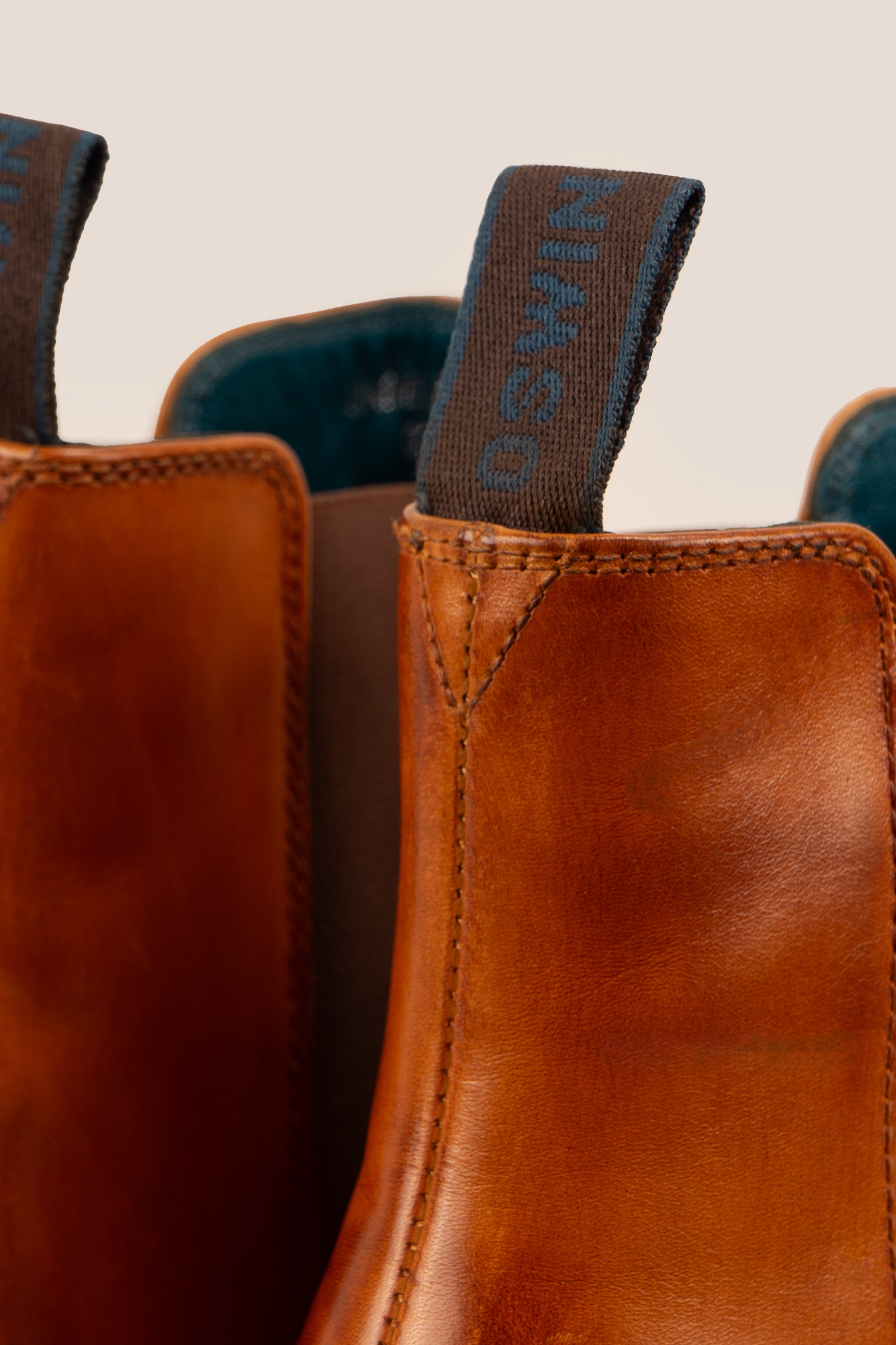 Michael tan leather Chelsea boots for men with elastic sides and pull tab, perfect for smart-casual and formal wear.