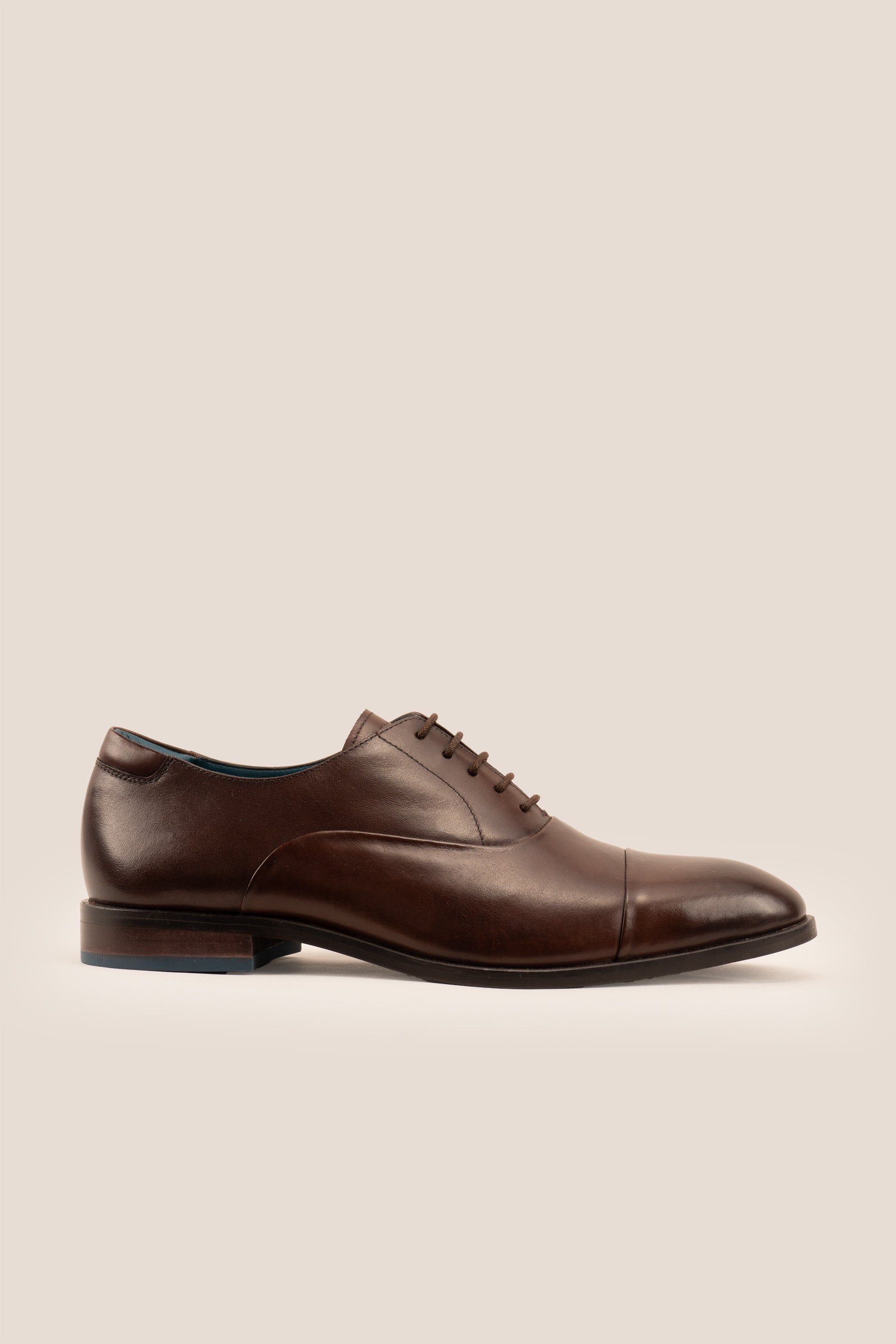 Men’s Jarvis brown oxford lace-up leather shoes with sleek design, crafted for elegant office wear and lasting comfort.