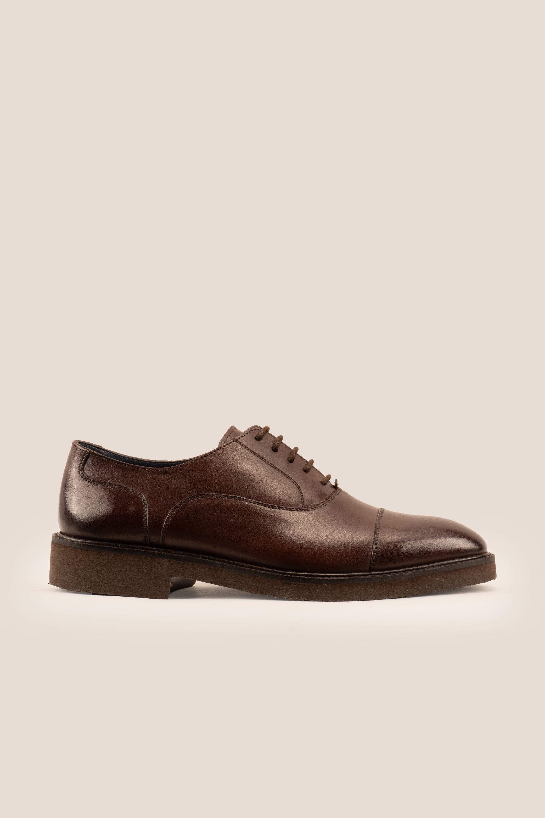 Flint Brown men’s lace-up Oxford shoes made from high-quality brown leather, ideal for formal and office wear.