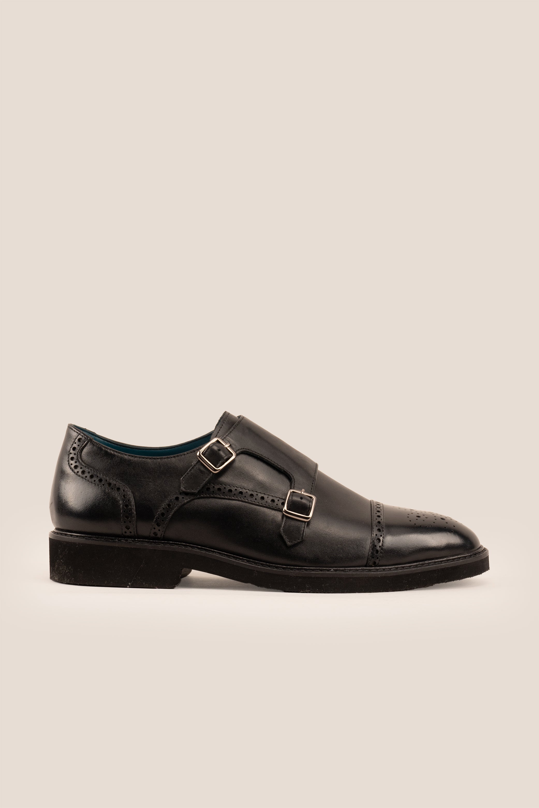 Shelby Black monk strap brogue men’s leather shoes featuring detailed brogue pattern and premium black leather for formal and smart wear.